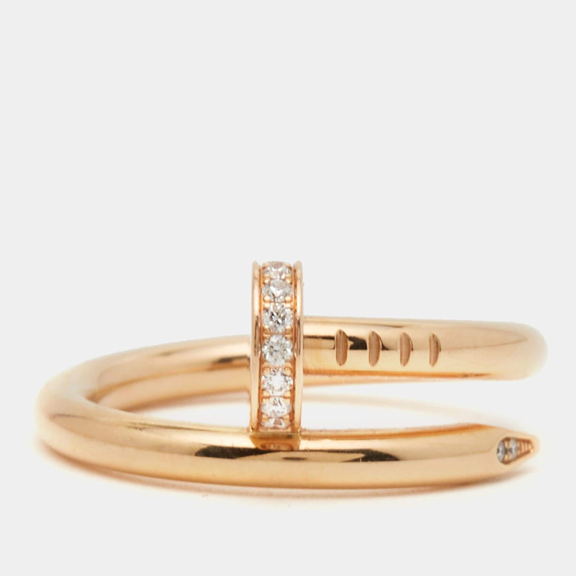 The Cartier Juste Un Clou ring is an iconic and luxurious piece of jewelry. Crafted from gleaming 18k rose gold and diamonds, its sleek and minimalist design captures the essence of a nail transformed into an elegant and distinctive fashion