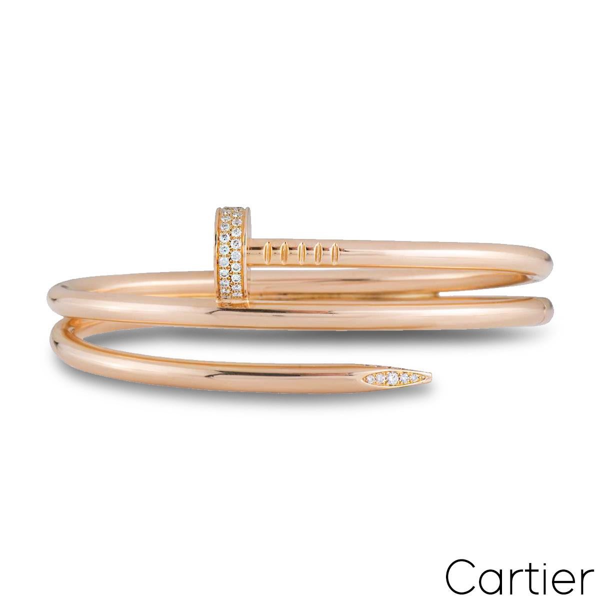 An 18k rose gold and diamond Cartier bracelet from the Juste Un Clou collection. The bracelet is in the style of a nail wrapping around the wrist with 62 round brilliant cut pave set diamonds to the head and tip, totalling 0.51ct. The bracelet