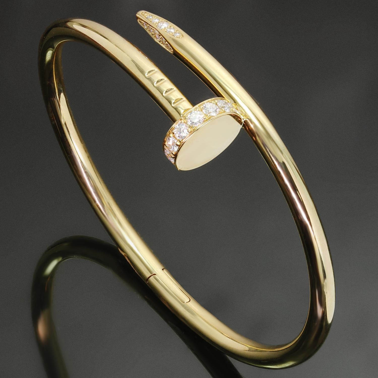 Dieser schicke Armreif mit Scharnier aus der Collection'S Juste Un Clou von Cartier ist aus 18er Gelbgold gefertigt und mit runden, brillanten D-F VVS1-VVS2-Diamanten mit einem geschätzten Gewicht von 0,58 Karat gefasst. Dieses Armband ist eine