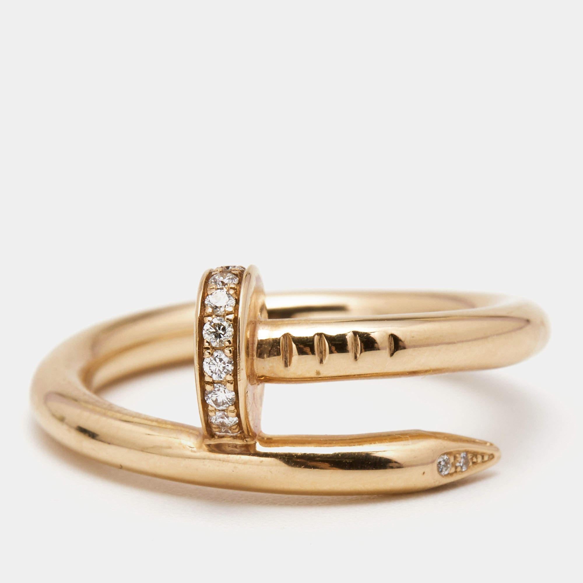 The Cartier Juste Un Clou ring is a luxurious and captivating piece of jewelry. Crafted in exquisite 18k rose gold, it features a striking nail-inspired design adorned with brilliant-cut diamonds. This elegant ring combines modern edginess with