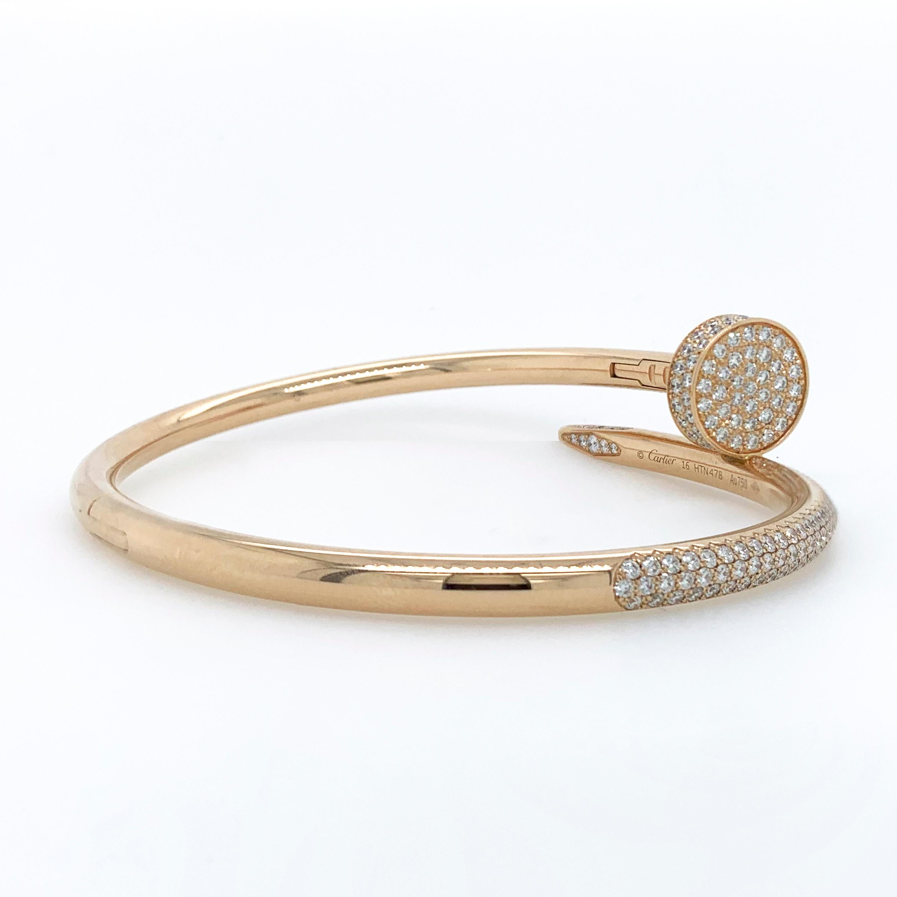 Cartier Juste Un Clou diamond nail bracelet in 18k rose gold, accompanied by Cartier box.

This bangle features 374 pave set round brilliant cut diamonds totaling approximately 2.26 carat with F-G color and VS+ clarity.  

Size 16
Numbered and