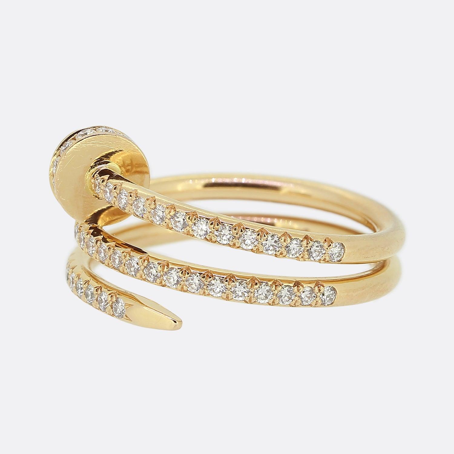 Here we have a fabulous diamond ring from the world renowned jewellery house of Cartier. This piece forms part of their 'Juste un Clou' collection with a triple wrap nail design which has been crafted from 18ct rose gold and pavé set at the front