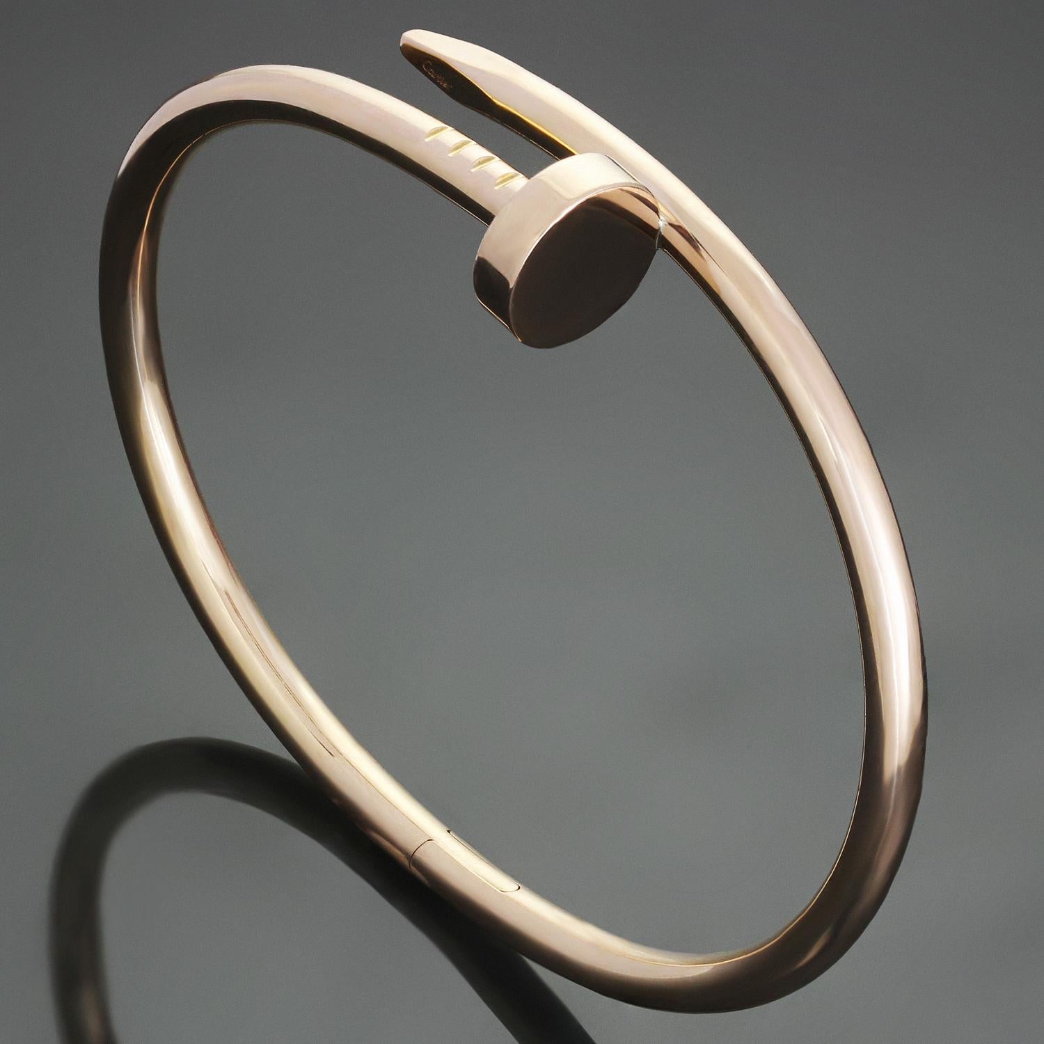 This elegant hinged bracelet from Cartier's iconic Juste Un Clou collection is crafted in 18k rose gold. This bangle is a size 17. Made in France circa 2017. Excellent condition. Comes with original pouch and paperwork.