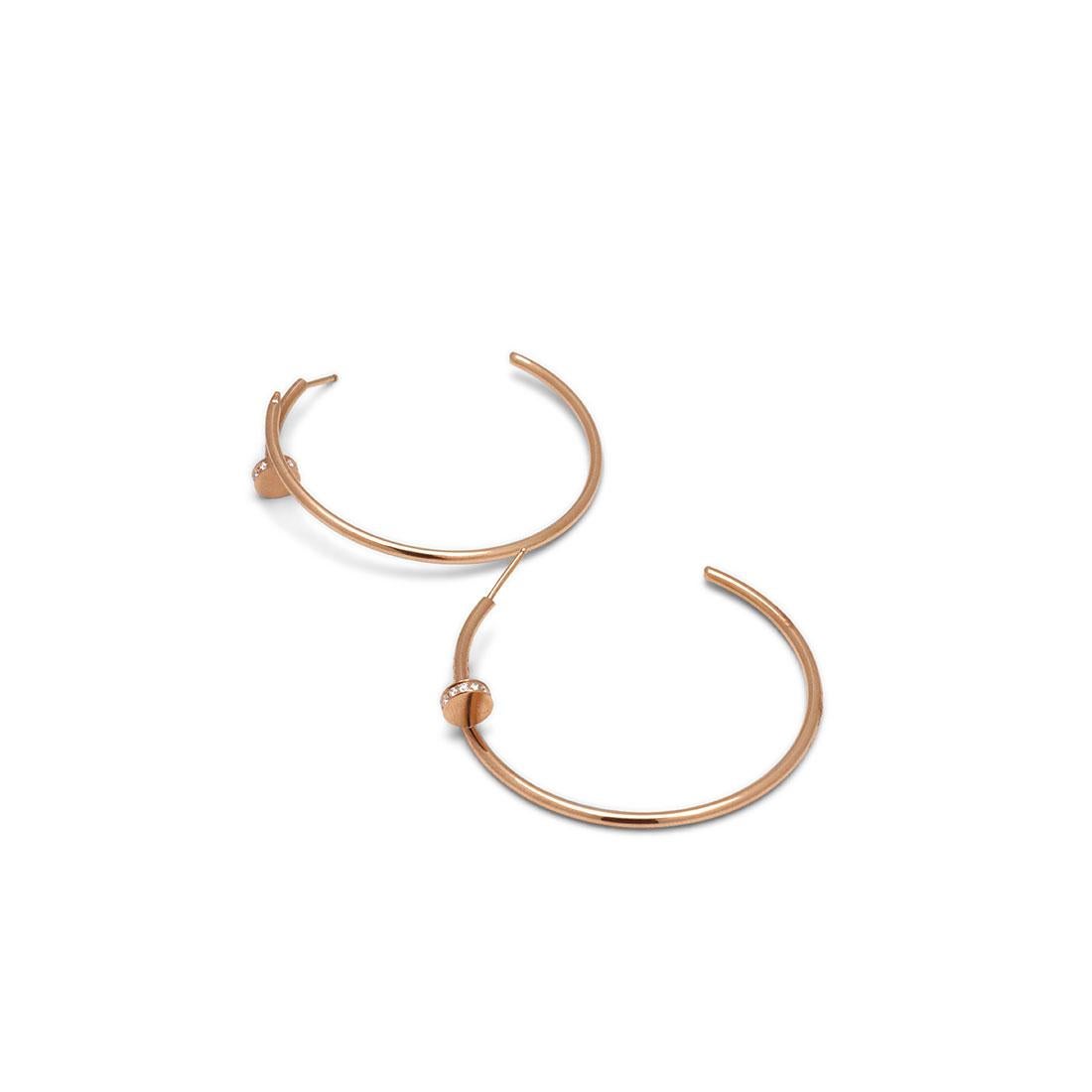 Authentic Cartier Juste Un Clou earrings crafted in 18 karat rose gold features the iconic Cartier nail motif taking the shape of hoop earrings. The earrings are set with 28 round brilliant cut diamonds for an estimated 0.17 total carat weight.
