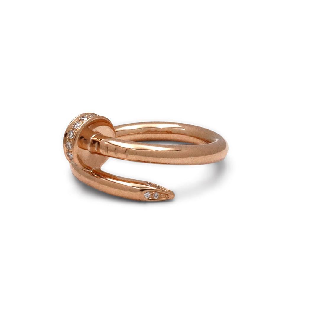 Authentic Cartier 'Juste un Clou' ring crafted in 18 karat rose gold and set with an estimated 0.17 carats of high-quality round brilliant cut diamonds. Signed Cartier, 51, 750, with serial number and hallmarks. Ring size 51 (US 5 3/4). The ring is