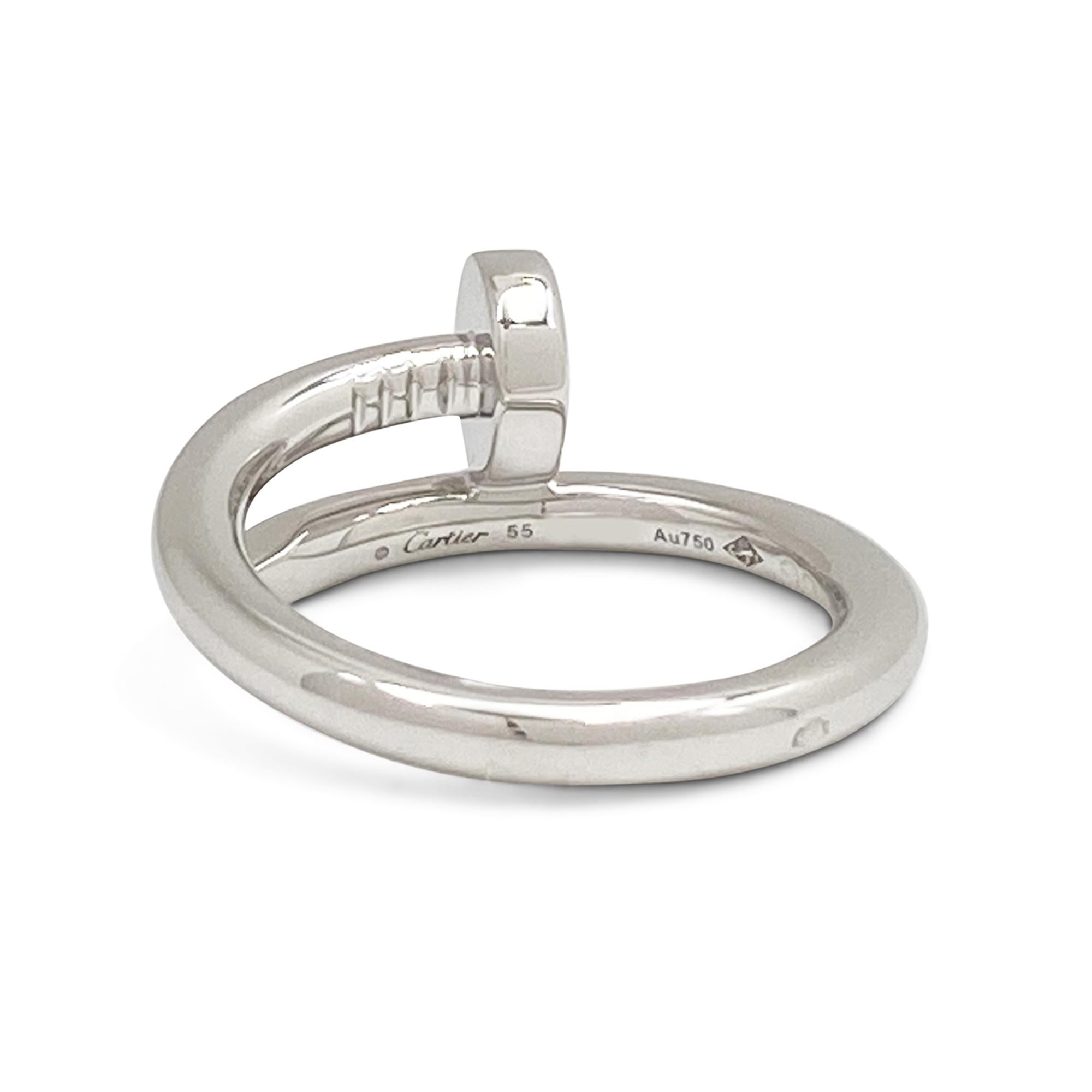 Designed as a 'just a nail', this authentic Cartier 'Juste un Clou' ring is modern, transcending the everyday, yet bold. The nail ring is an innovative twist on a familiar and ordinary object. Signed Cartier, 55, Au750, with serial number. Size 55