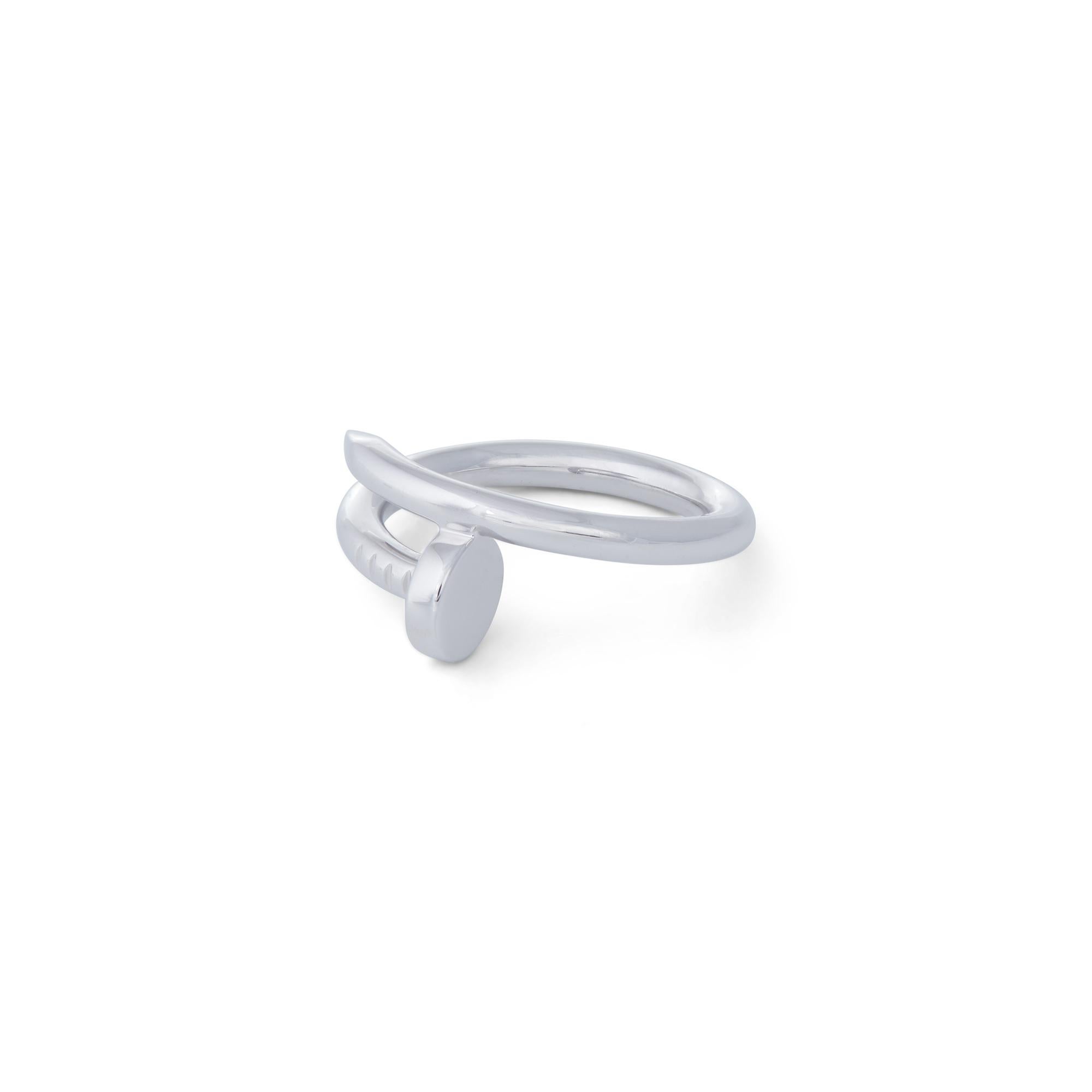 Designed as a 'just a nail', this authentic Cartier 'Juste un Clou' ring is modern, transcending the every day, yet bold. The nail ring is an innovative twist on a familiar and ordinary object. Size 56 (US 7.5), 2.65mm wide. Signed Cartier, 56,