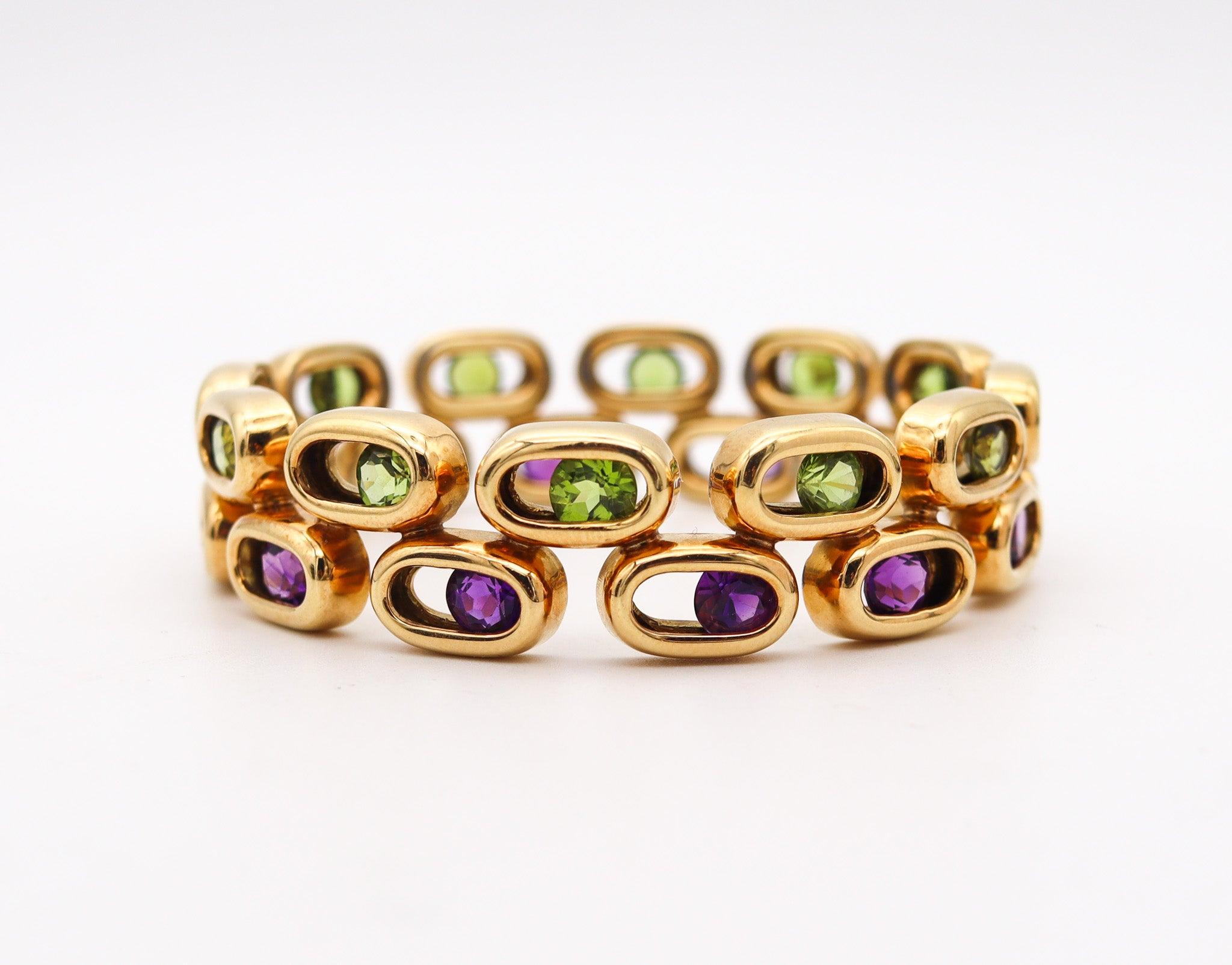 Modernist CARTIER Kinetic Geometric Bangle In 18Kt Yellow Gold With Peridots & Amethystes For Sale