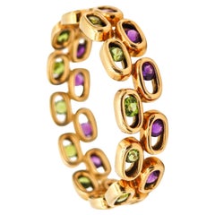 CARTIER Kinetic Geometric Bangle In 18Kt Yellow Gold With Peridots & Amethystes