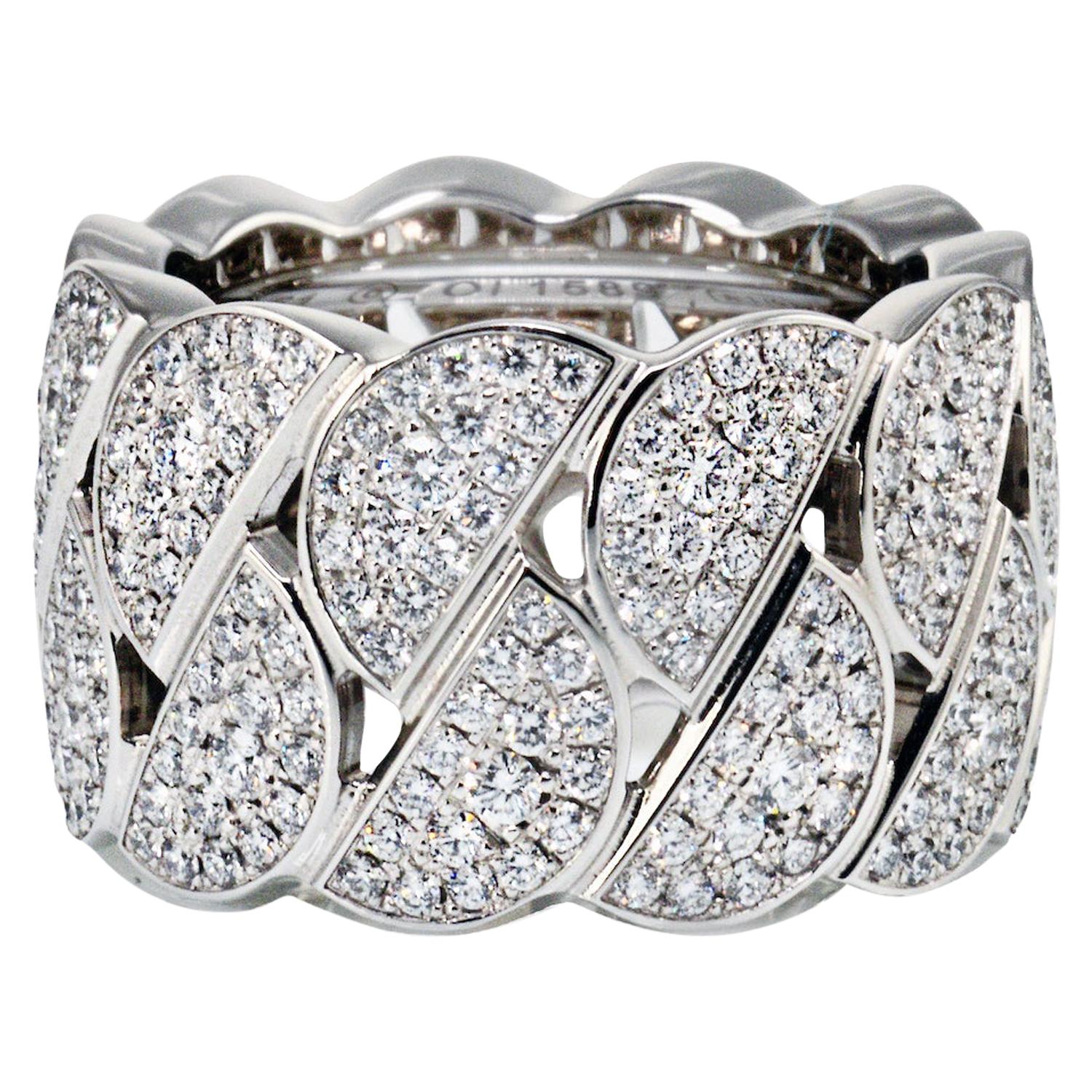 Ladies Cartier 18kt white gold and diamond #La Dona# wide ring comprised of a double row of half-moon shaped links that are all set with pavé round brilliant cut diamonds. Size EU 51.

With a copy of the original receipt.

Width: 13.5mm

Hallmarked: