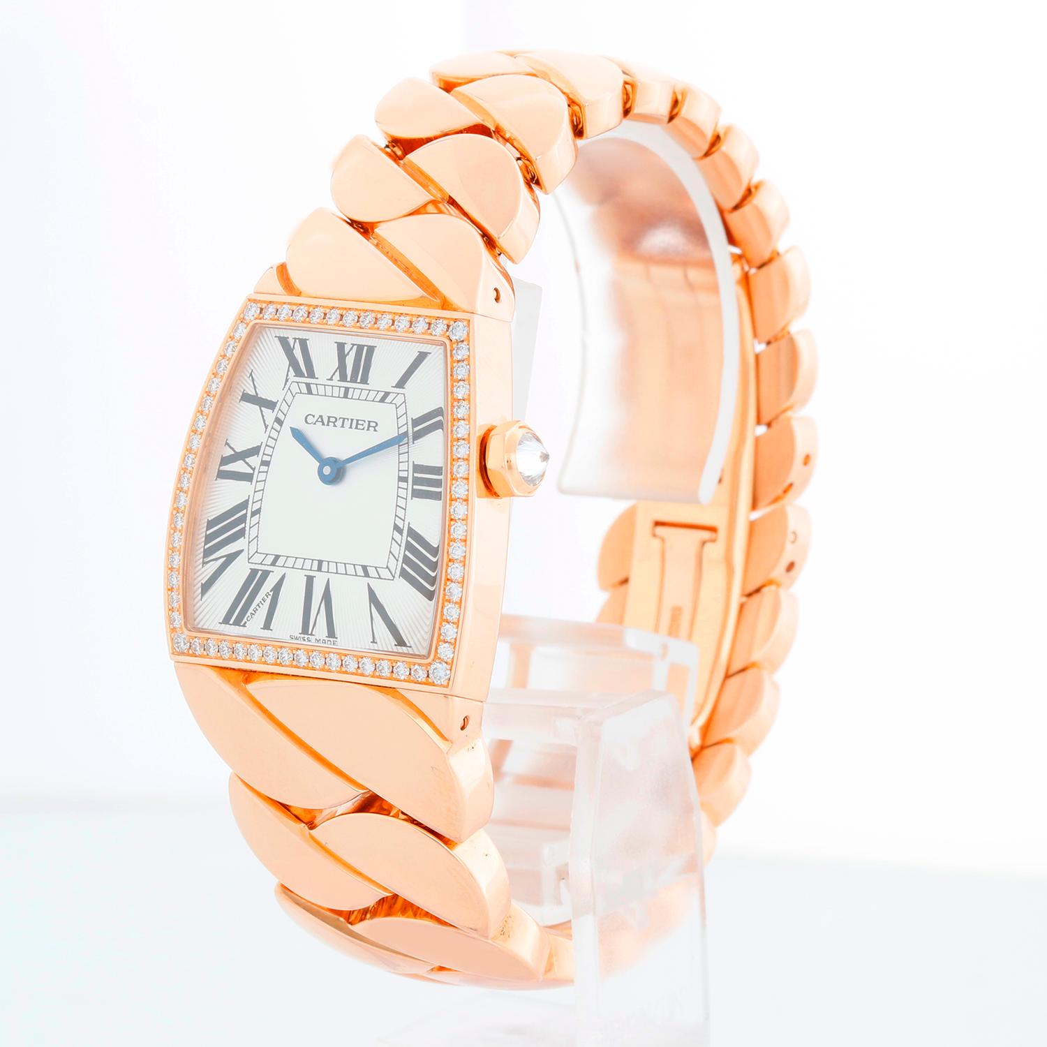 Cartier La Dona 18k Rose Gold Diamond Ladies Watch WE600501 - Quartz. 18K Rose Gold case with pave diamond bezel (28 mm). Silver dial with Roman numerals. 18k rose  gold bracelet; will fit up to a 6 3/4 inch wrist. Pre-owned with Cartier box. 