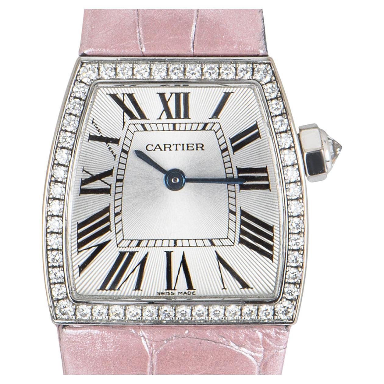 An 18k White Gold La Dona Ladies Wristwatch, silver guilloche dial with roman numerals and a secret signature at 'X', blued steel sword shaped hands, a fixed 18k white gold bezel set with approximately 51 round brilliant cut diamonds, an 18k white