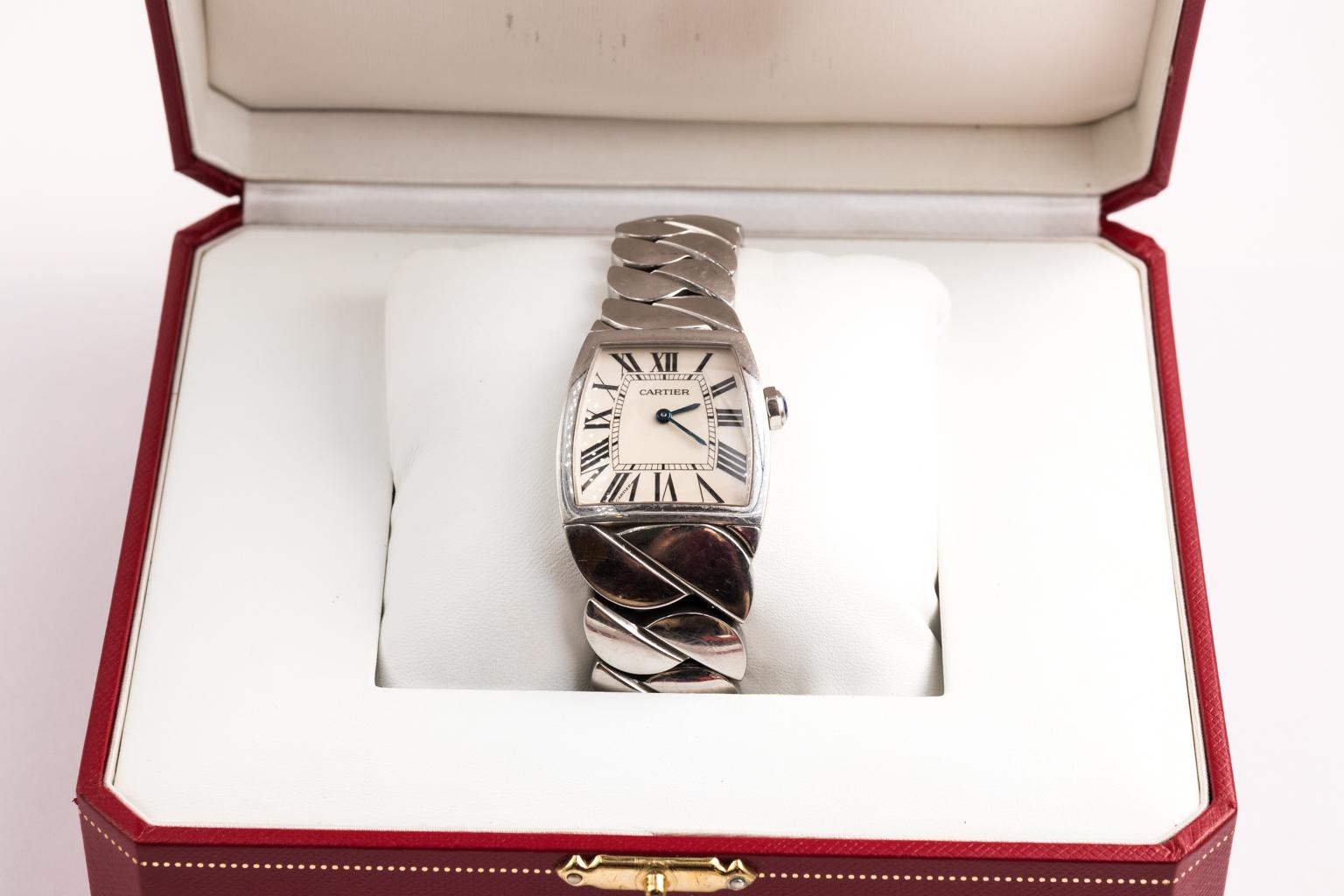 Cartier La Dona stainless steel watch with case. Comes with certificate.
