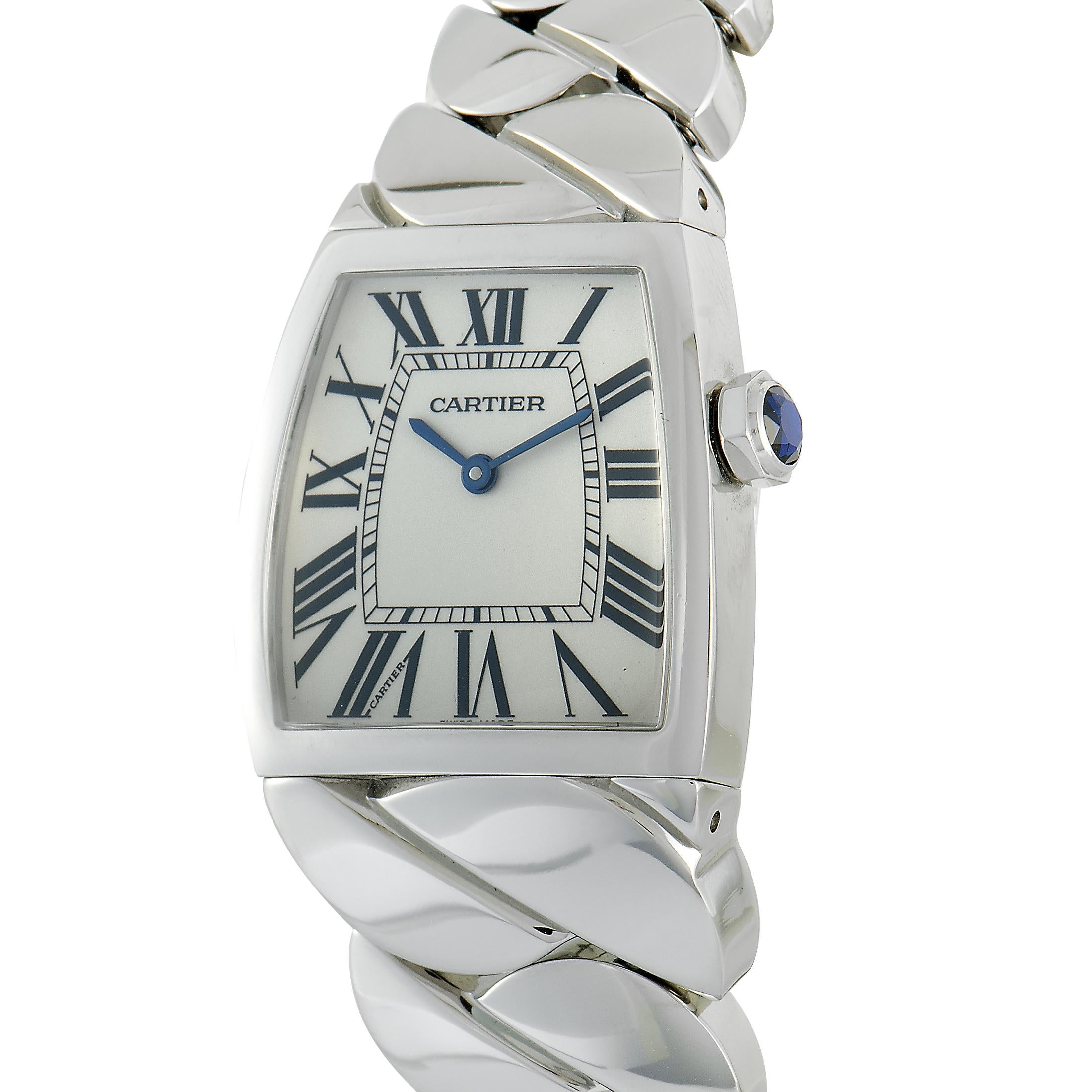 The Cartier La Dona, reference number W660012I, is presented with a water-resistant stainless steel case that is mounted onto a matching stainless steel bracelet. Powered by a quartz movement, the watch indicates hours and minutes upon the dial with