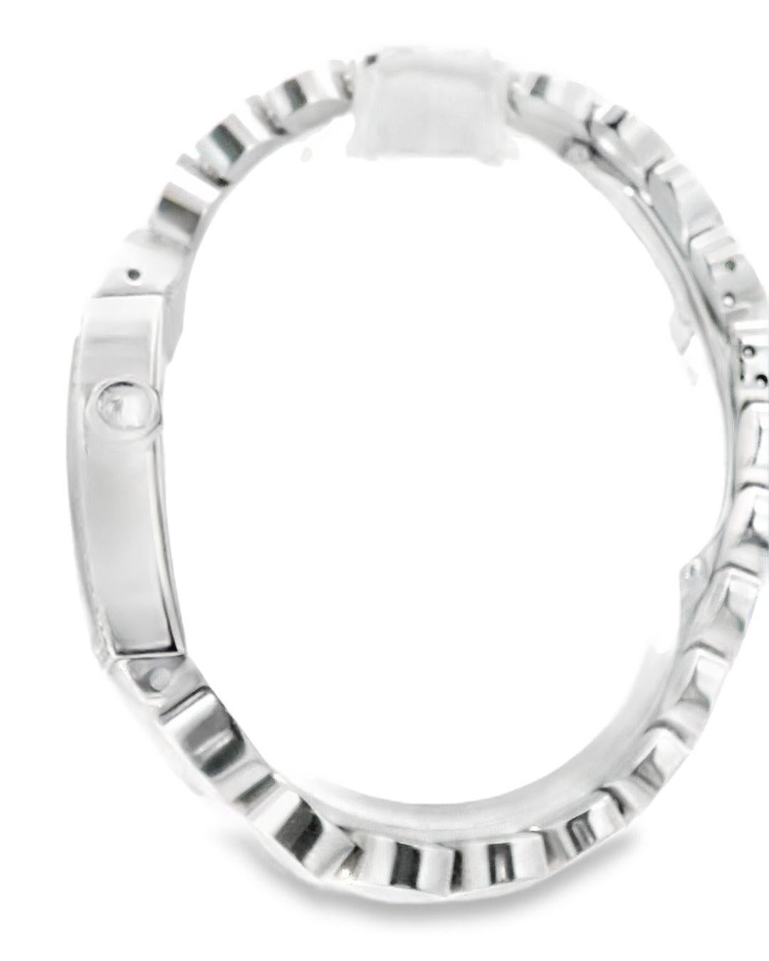 Cartier La Dona ladies watch. 27X29MM 18K white gold case with 18K white gold bezel with factory diamond set. Silver dial with blue hands and black Roman numeral hour marker. Minute markers in the inner dial. 18K white gold bracelet with hidden