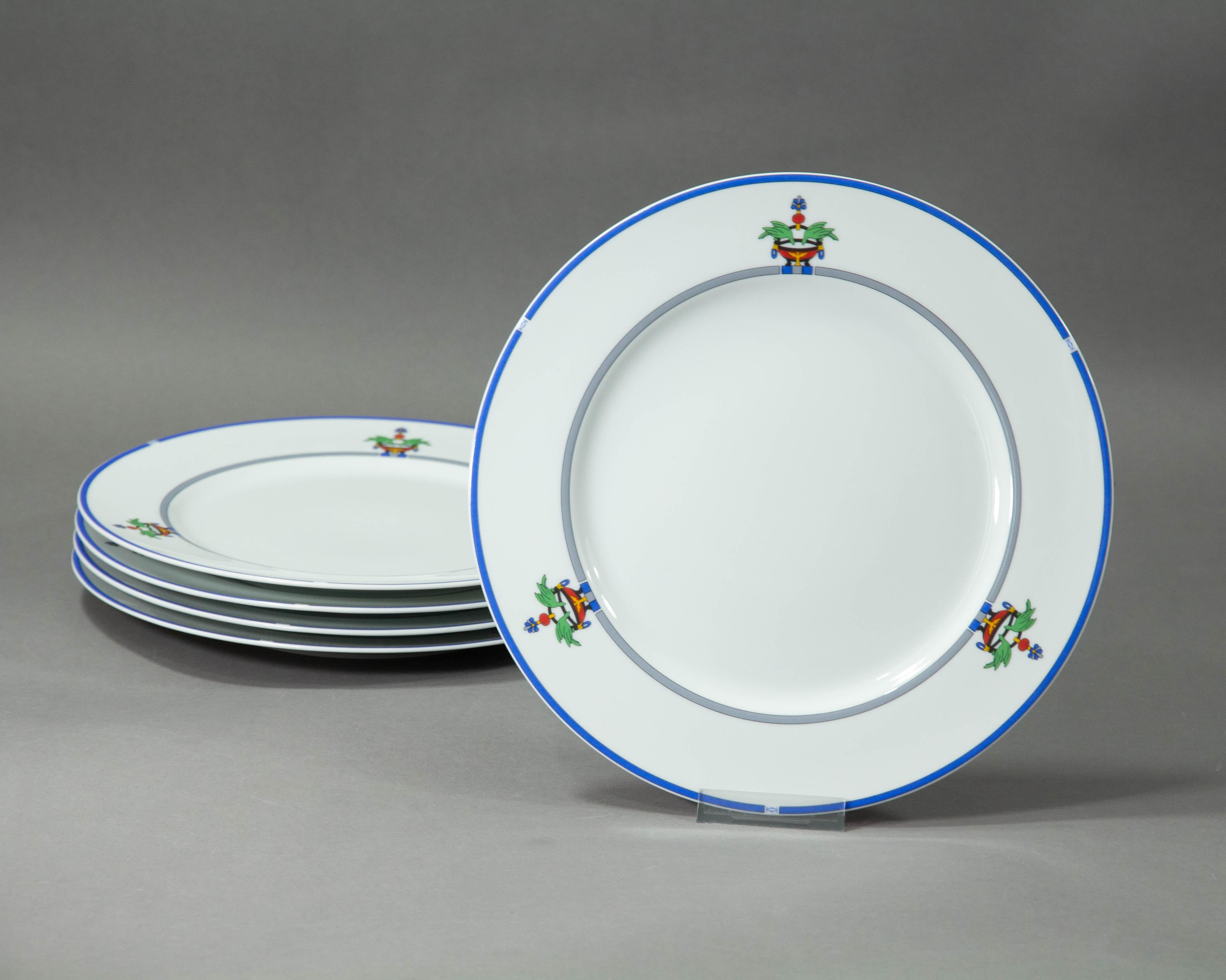 A Cartier Venetienne dinner plate.

The porcelain plate was made in Limoges for Cartier La Maison in 1989, the decoration is called 'Venetienne'.

The luxury jeweler and watchmaker Cartier made a range of high end housewares in the 1980s and