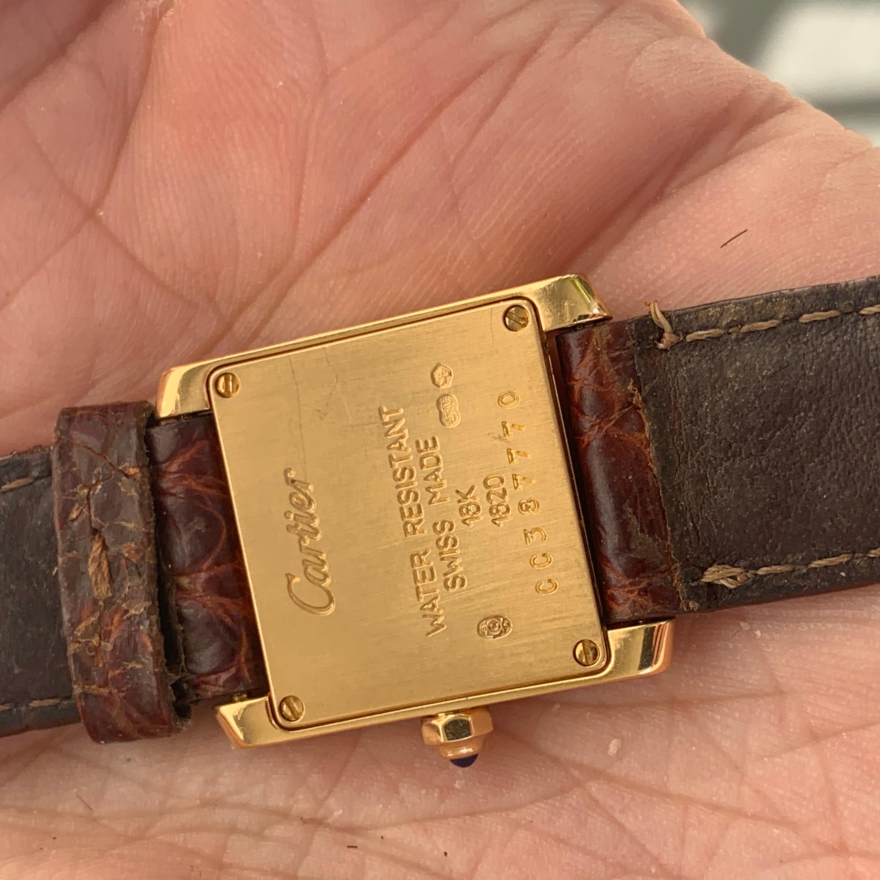 
Cartier Ladies 18k Yellow Gold Ladies Tank Francaise

Model =   W50002N2

Comes With:
Original Cartier Box
Original Cartier Papers 

Mesurements: 	Rectangular 18K yellow gold 20.0 x 25.0 mm case. Octagonal crown set with a blue sapphire