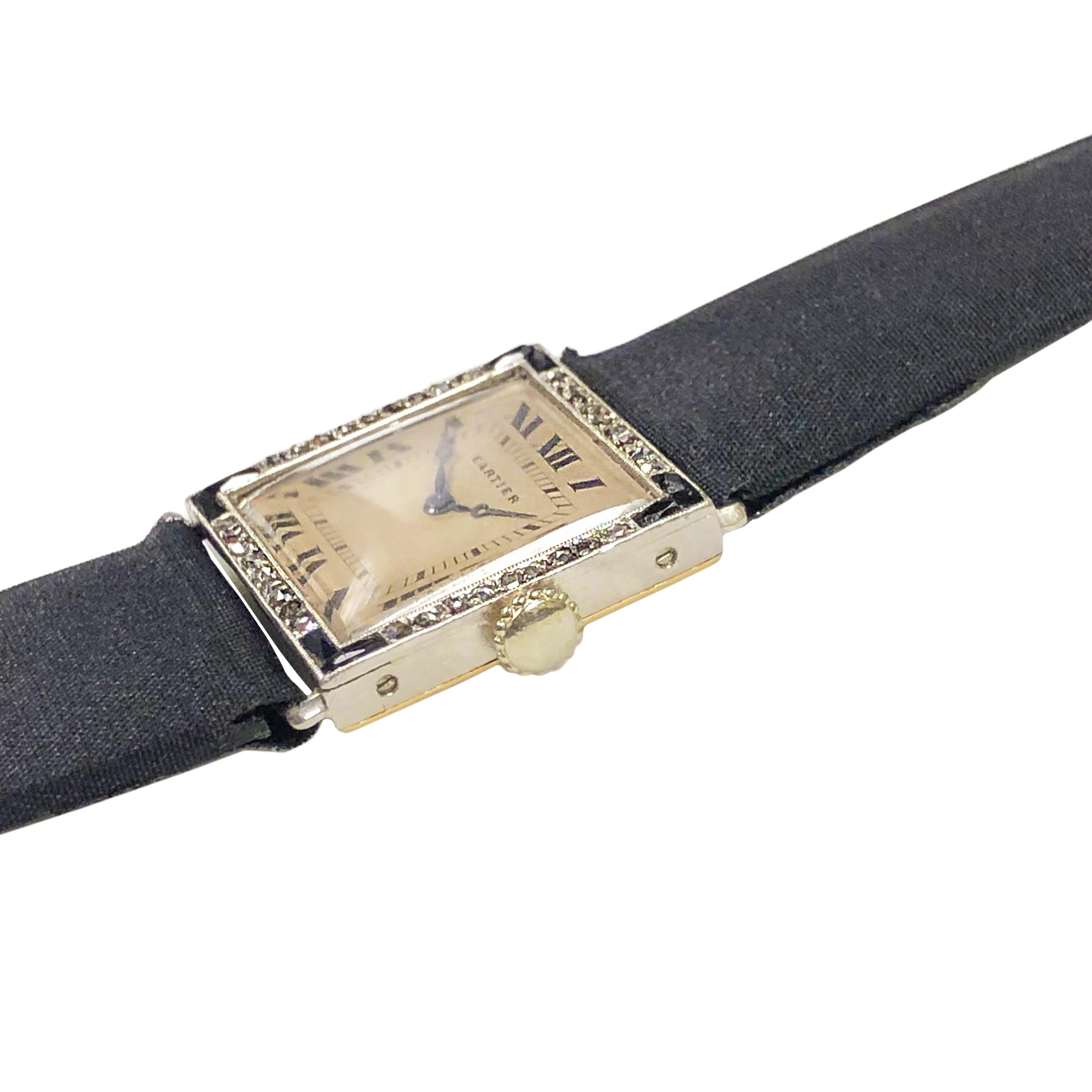 Circa 1920s Cartier Ladies Wrist Watch, 20 X 20 MM French Stamped and numbered Platinum Case with 18K Yellow Gold back, Rose cut Diamonds and Onyx set Bezel. 18 Jewel Mechanical, Manual Wind ( EWCC ) European Watch and Clock Company Movement.