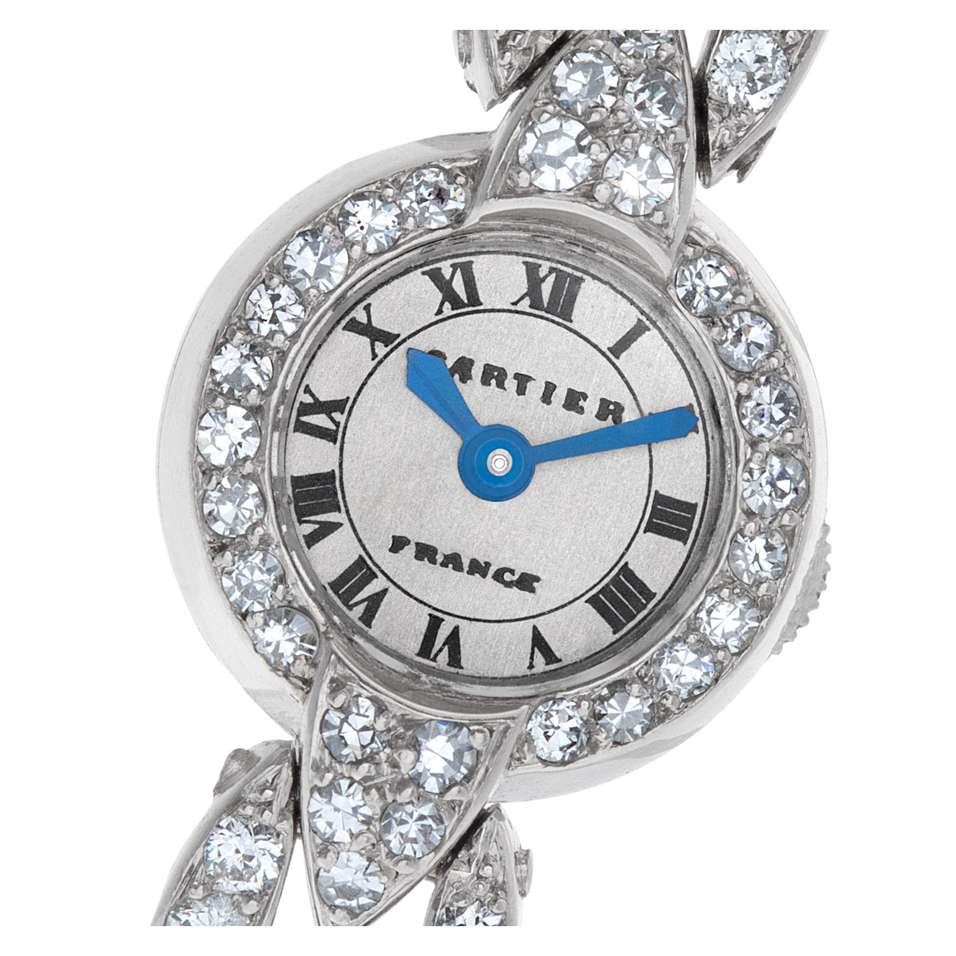 ESTIMATED RETAIL $85000.00 YOUR PRICE $48900.00 Very fine, rare & elegant Cartier European Watch & Clock Co. Art Deco cocktail watch in platinum set with approximately 4.50 carats in bright diamonds. 16 jewels. Manual back wind & set. With original