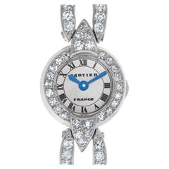 Cartier Montre de cocktail pour femme en platine et diamants