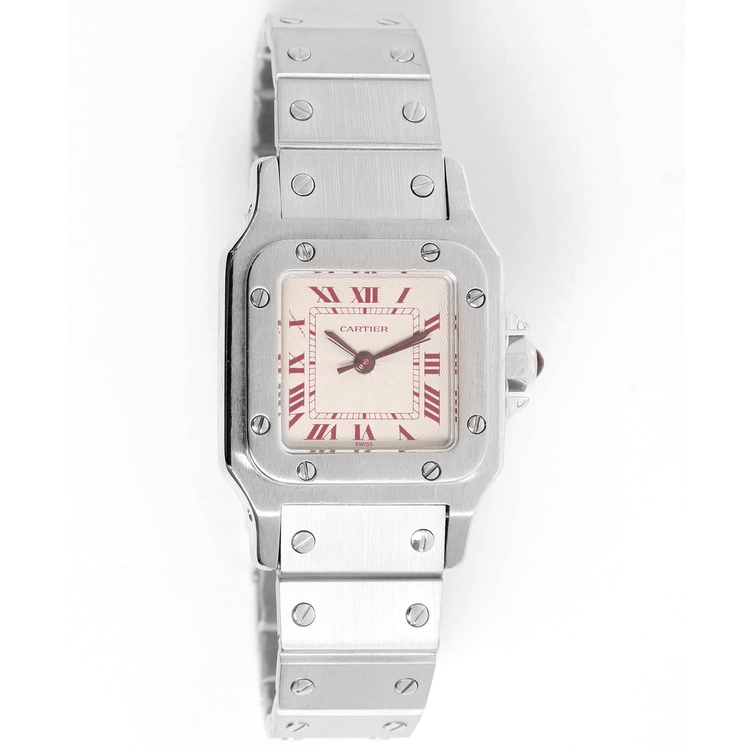 Extremely Rare Cartier Platinum Santos Galbee Ladies Watch -  Automatic. Platinum ( 24 mm ). White dial with red roman numerals and red tracking. Platinum bracelet with deployant claps. Pre-owned with Cartier box papers.