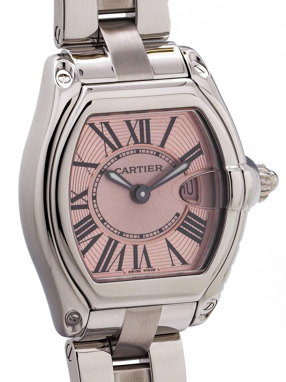 
Cartier lady Roadster Breast Cancer limited edition circa 2008. Featuring 31 x 37mm tonneau shaped case with sapphire crystal and date at 3 o’clock. With classic stretch Roman figures dial, with 2 tone pink dial with inner breast cancer ribbon