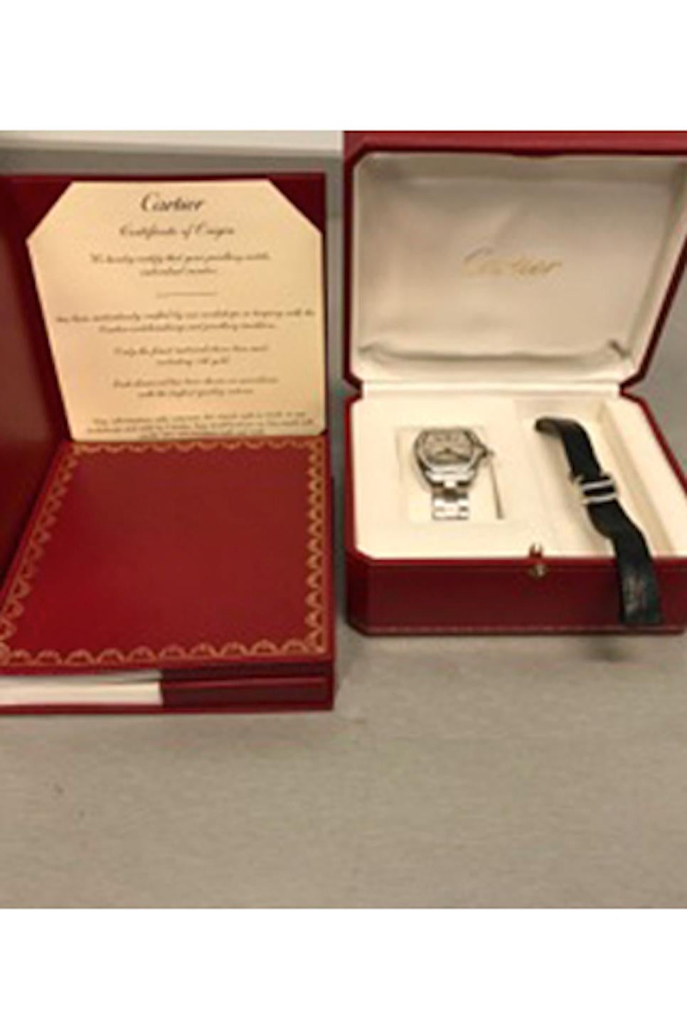 Cartier Ladies Roadster Model WE5002X2 Ladies Quartz with Date wrist watch. 18k White Gold rectangular tonneau style case with Cartier Diamond bezel and Diamond cabachon setting crown (30x35mm). Water-Resistant to 100 Meters - 330 Feet, 18k White