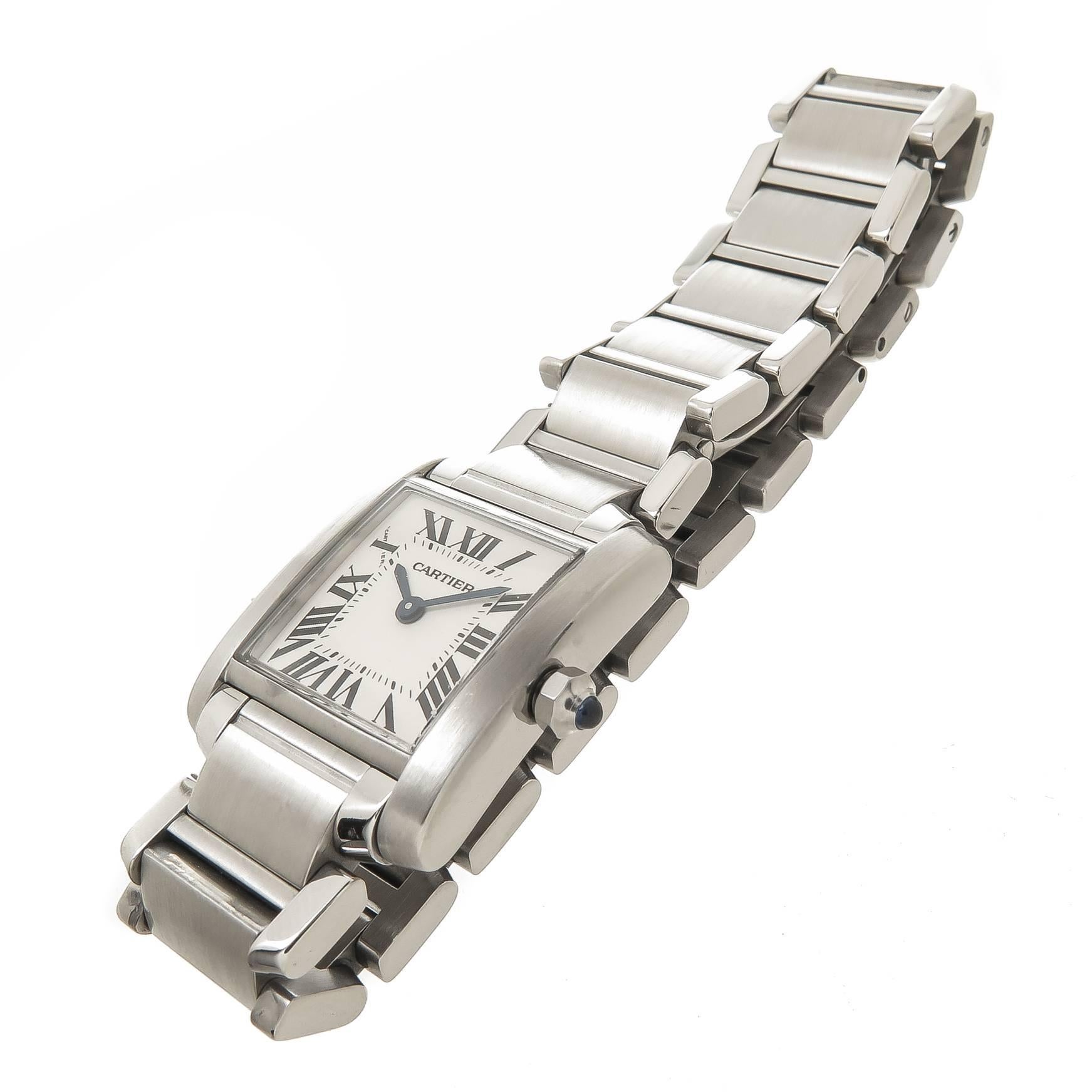 Circa 2015 Cartier Tank Francaise Collection Ladies Wrist Watch, 24 X 20 MM Water Resistant Case, Quartz Movement, White Dial with Black Roman Numerals, Sapphire Crown. 9/16 inch wide Steel Bracelet with Deployment clasp, watch length 6 inches.