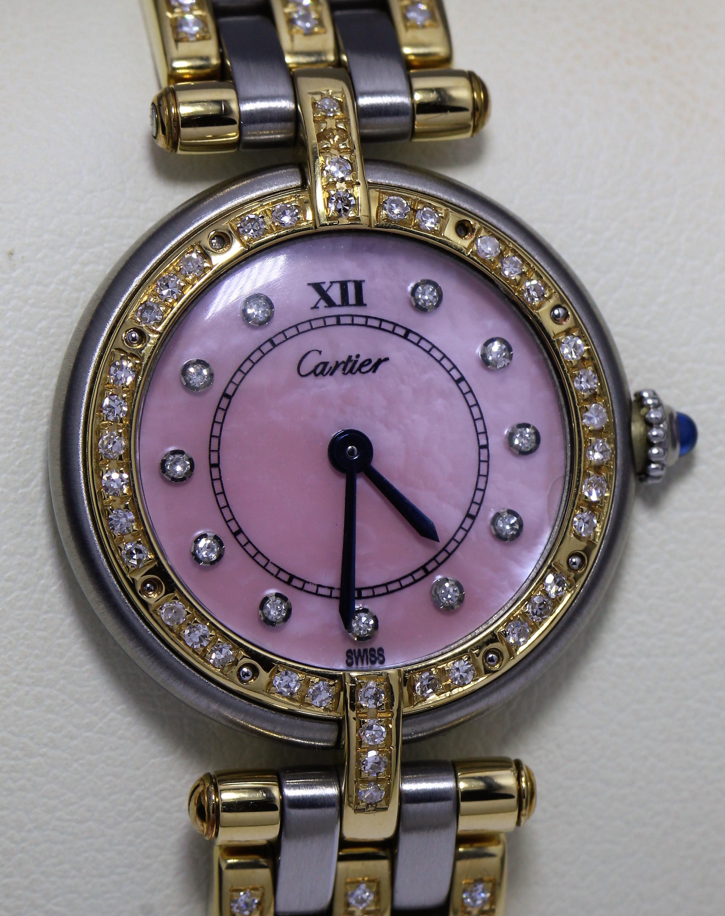 Cartier Ladies Watch with Pink Oyster Face and Diamond Studded Bezel

Diamond Studded Bezel, Band, and Hour Markers