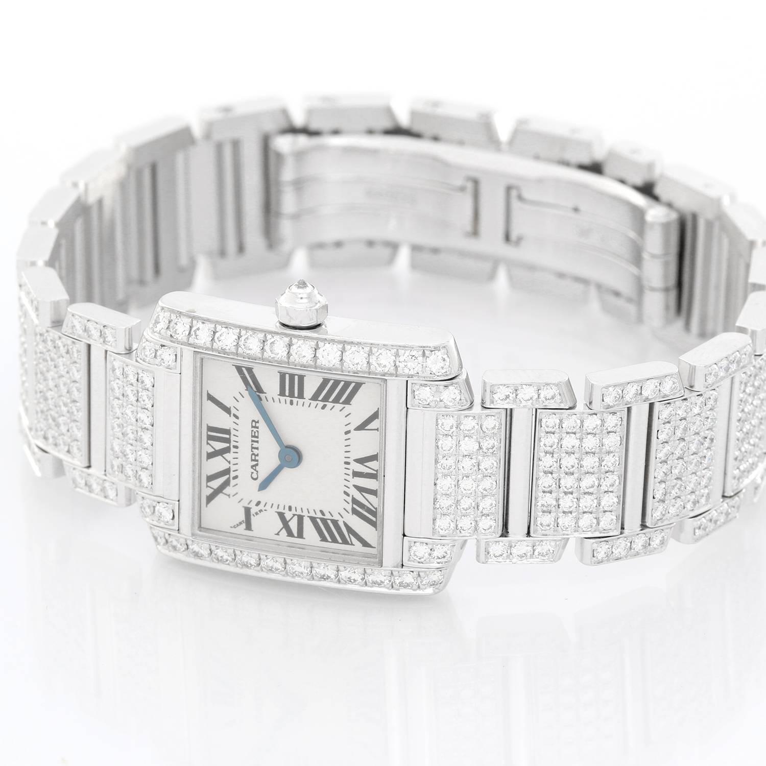 Cartier Ladies White Gold and Diamonds Tank Francaise WE1002SD -  Quartz. 18k White gold with diamonds, 20mm x 25mm. Ivory colored with black Roman numerals; sapphire crystal. 18k White Gold and diamonds with deployant clasp. Pre-owned with diamond