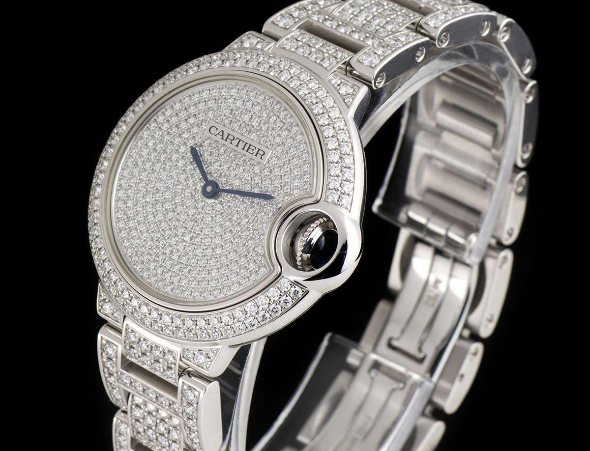 A Fully Loaded Ballon Bleu Ladies Wristwatch, pave diamond dial set with approximately 290 round brilliant cut diamonds (~1.05ct), sword shaped blued steel hands, a white gold fixed bezel and white gold lugs set with approximately 127 round