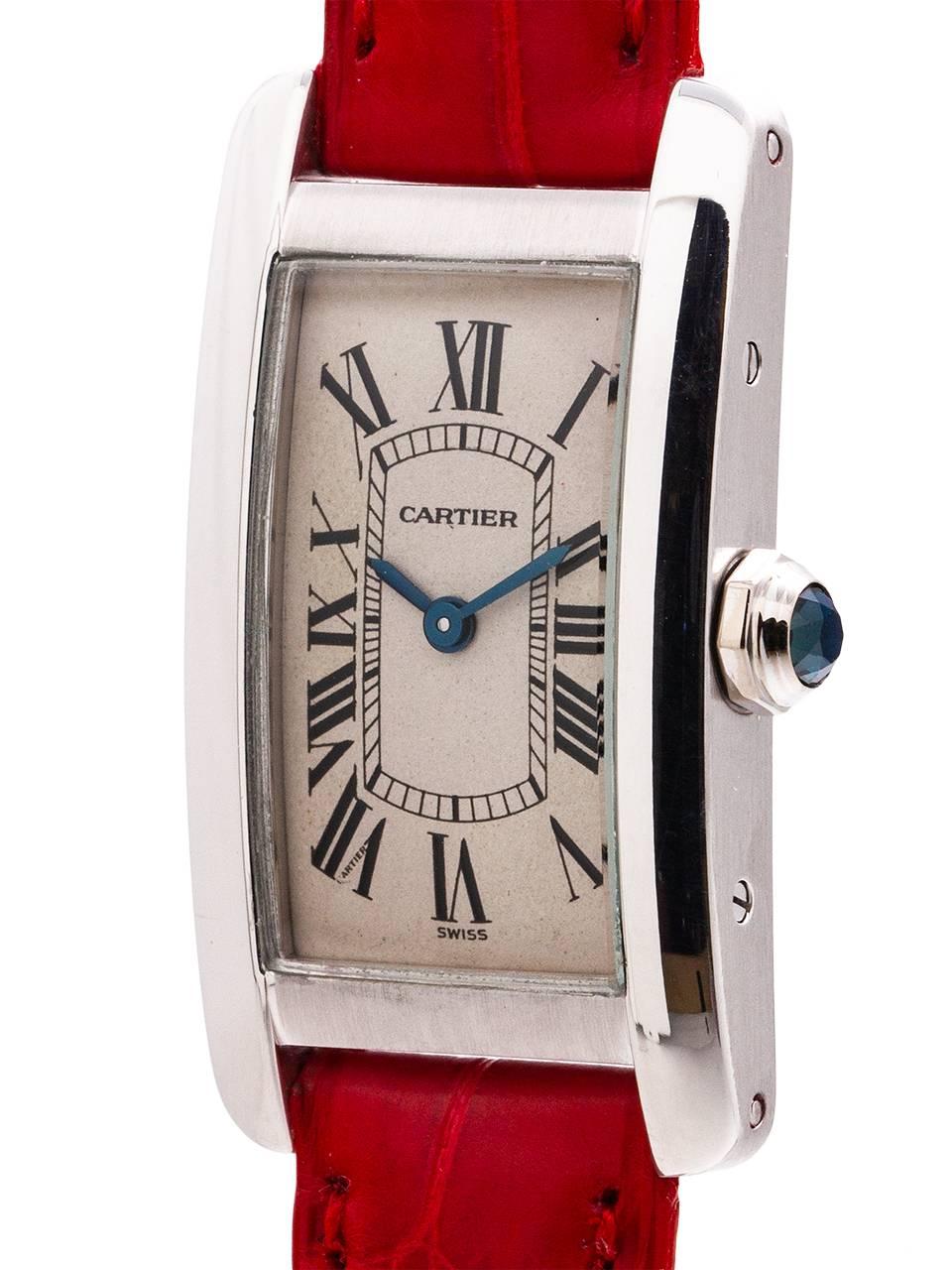 
Classic Cartier lady’s 18K white gold Tank American ref 1713 circa 1990’s. Featuring classic curvex style 20 X 35mm case secured by 4 side screws and 8 caseback screws. With original classic silvered dial with Roman figures with Cartier “secret”