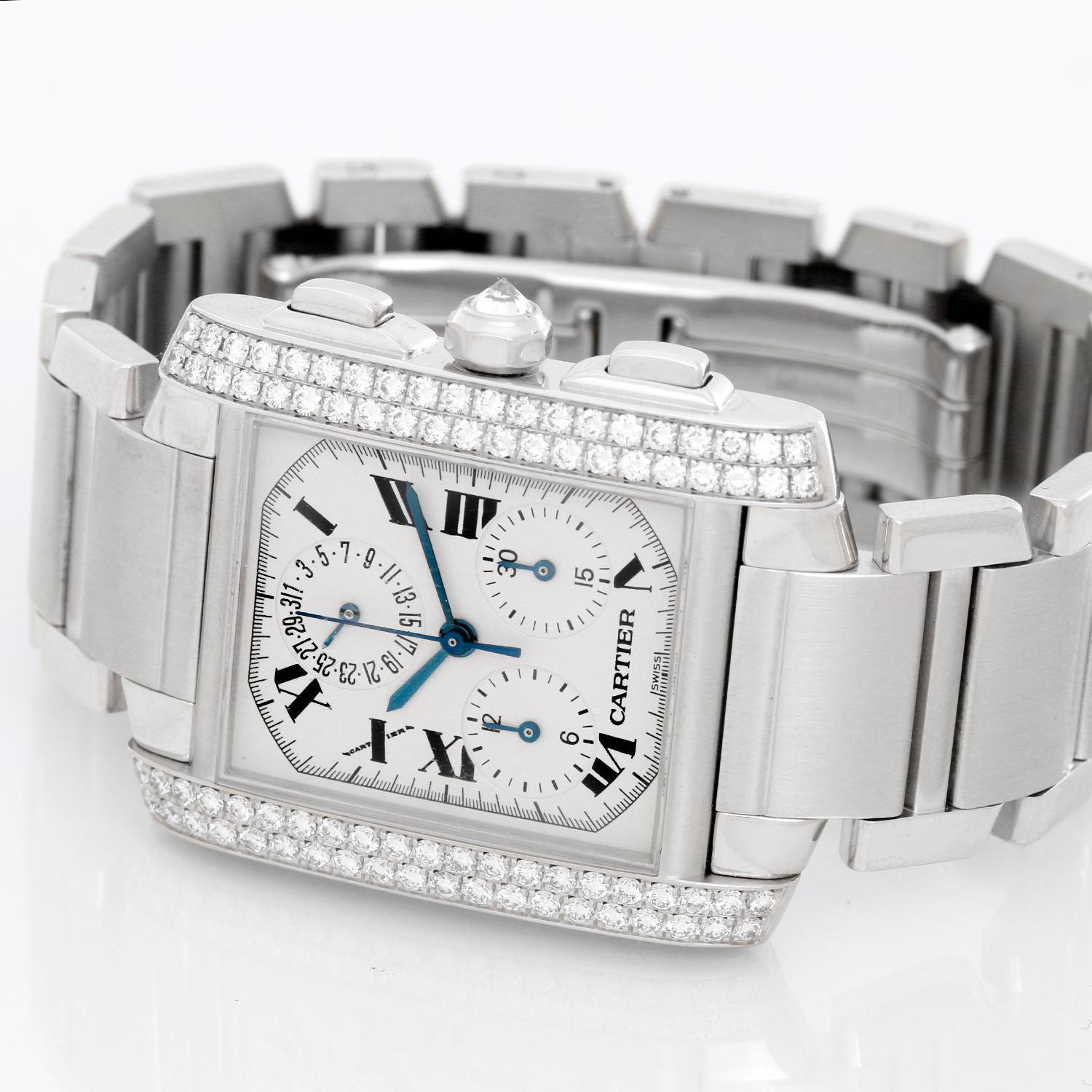 Cartier Tank Francaise 18K White Gold Chronograph - Automatic. 18K White Gold with two row of diamonds ( 29 x 35 mm ). Silvered dial with subseconds, date and chronograph. 18K White gold Cartier bracelet. Pre-owned with Cartier box .
