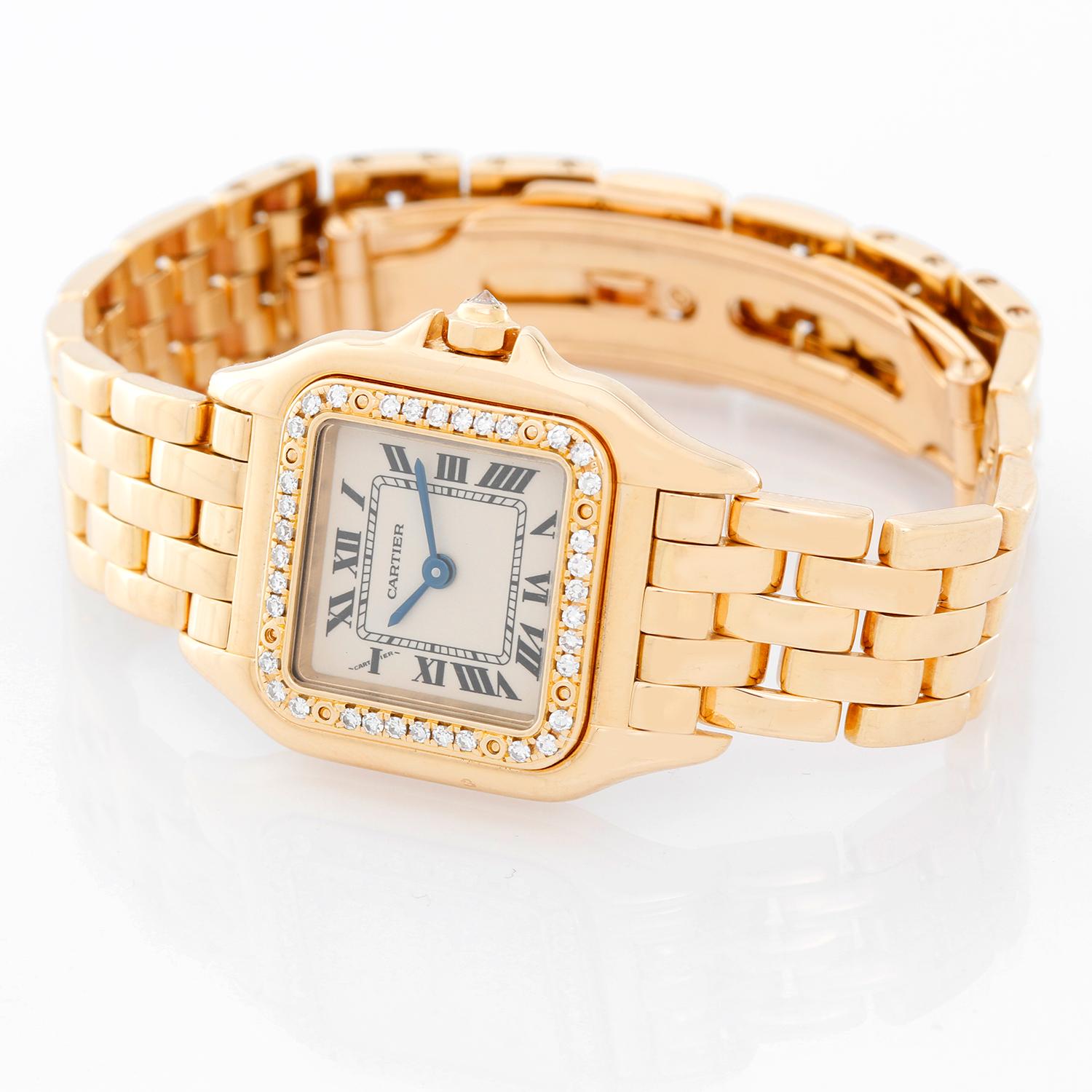 Cartier Panther Ladies 18k Yellow Gold Diamond Watch - Quartz. 18k yellow gold case with factory diamond bezel (21mm x 30mm). Ivory colored dial with black Roman numerals. 18k yellow gold Panther bracelet. Pre-owned with Cartier box and book.
