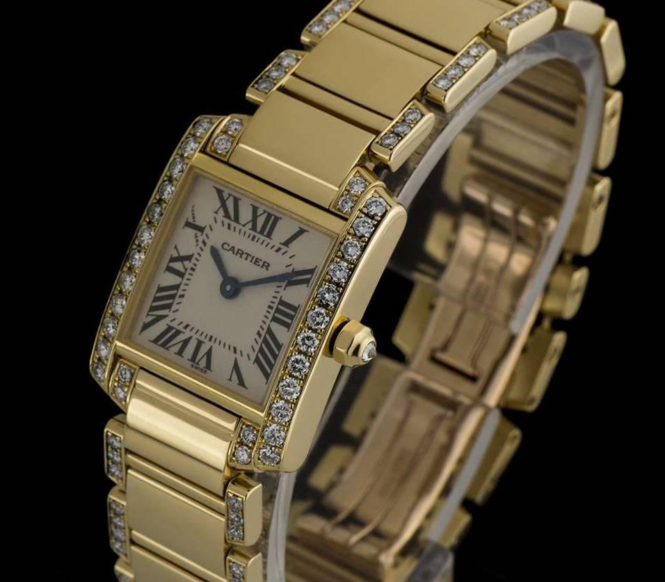An 18k Yellow Gold Diamond Set Tank Francaise Ladies Wristwatch, silvered dial with roman numerals and a secret signature at 