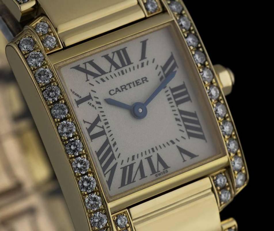 Cartier Ladies Yellow Gold Diamond Tank Francaise Roman Dial Quartz Wristwatch In Excellent Condition In London, GB