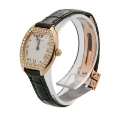 Cartier Ladies yellow Gold Diamond Tonneau Tortue Manual Wristwatch, c 1980