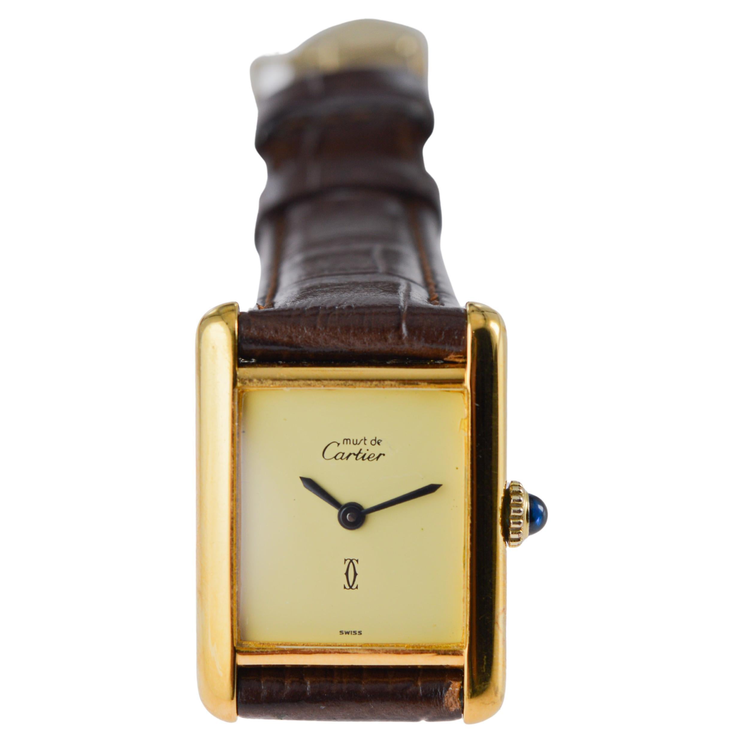 Reloj de pulsera Cartier para señora en oro amarillo circa 1970's Todo original en venta 9