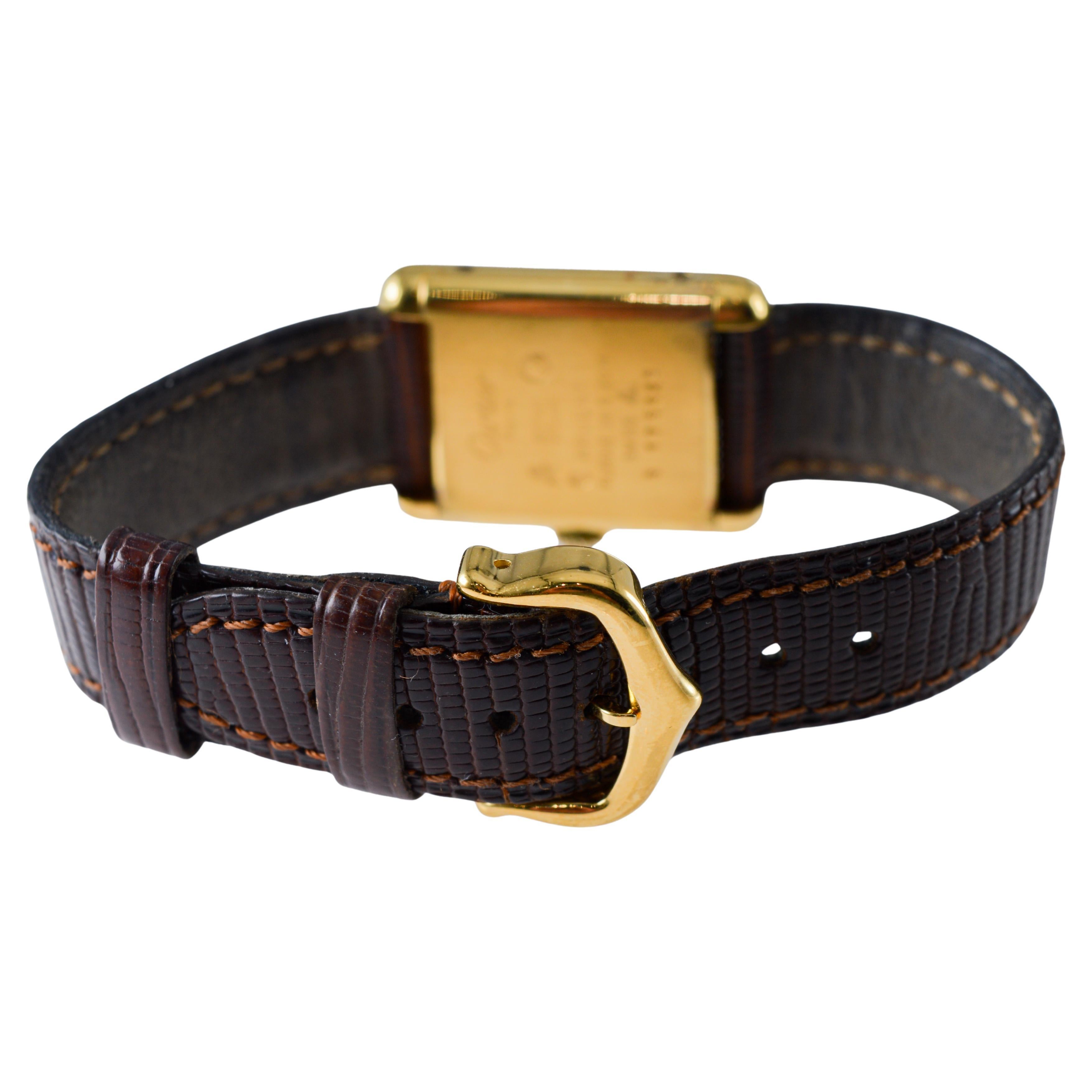 Reloj de pulsera Cartier para señora en oro amarillo circa 1970's Todo original en venta 12