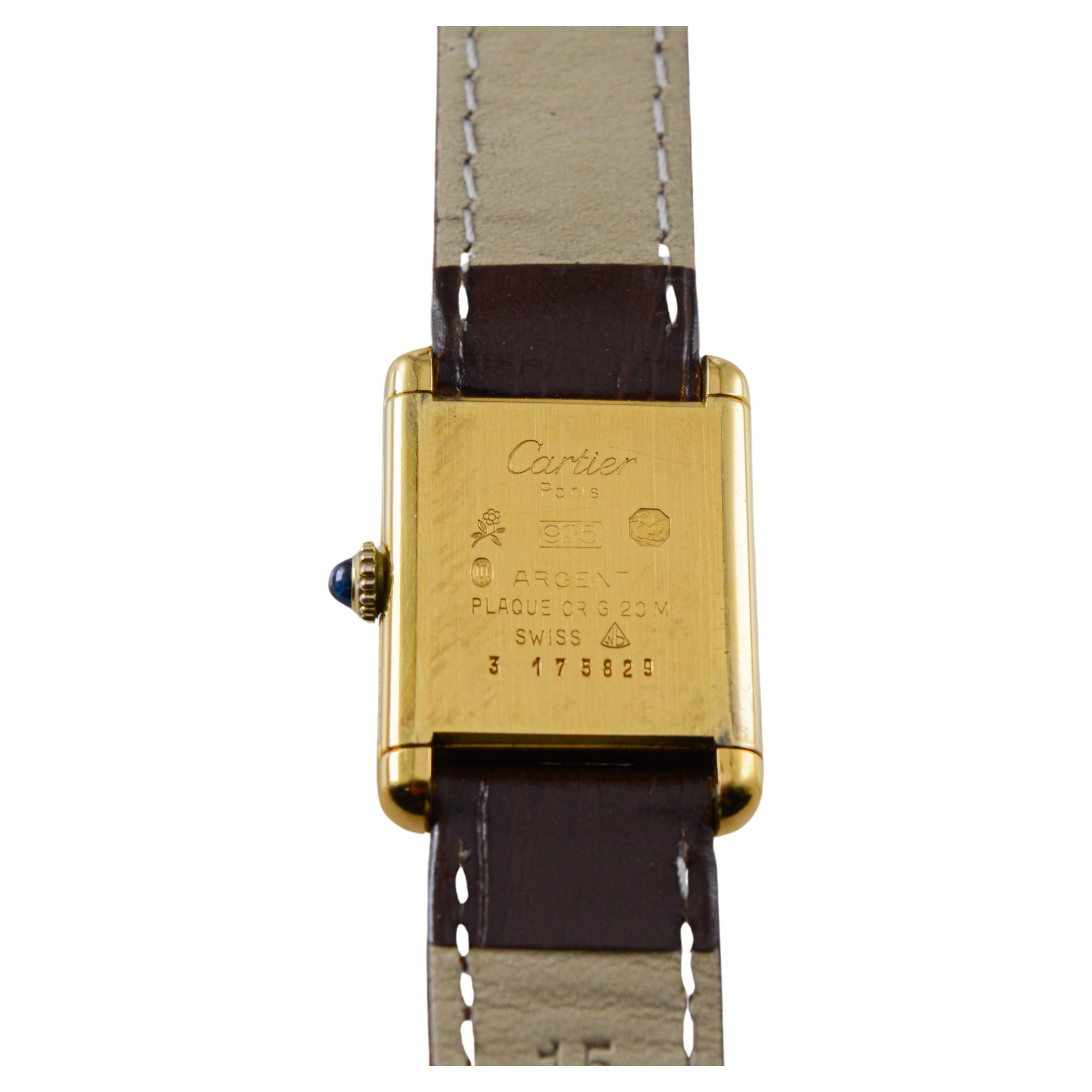 Reloj de pulsera Cartier para señora en oro amarillo circa 1970's Todo original en venta 13