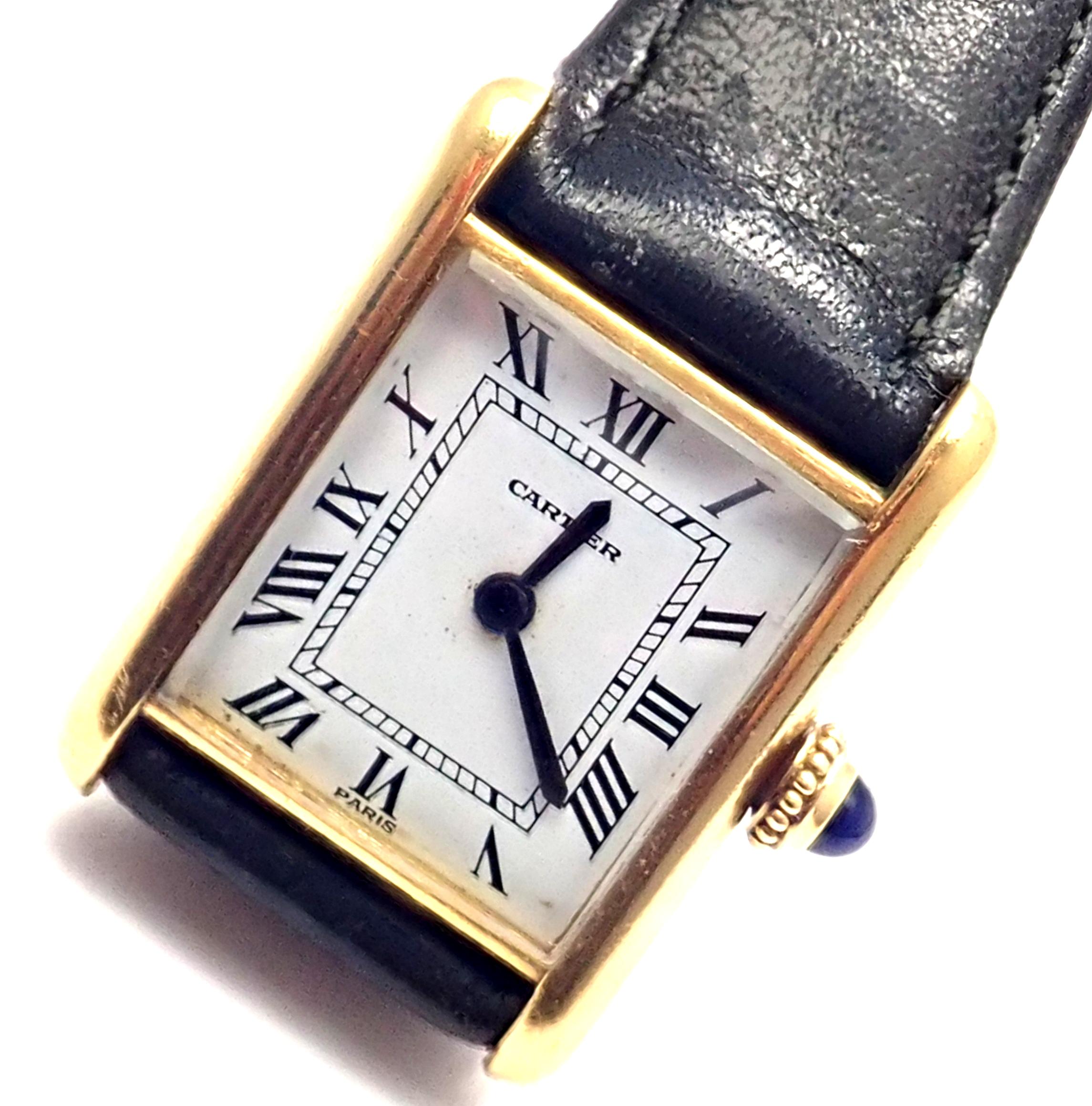 Lady's 18k yellow gold Cartier Mini Tank wristwatch.
Details: 
Brand: Cartier
Case Material: 18k Yellow Gold
Dial Color: White
Movement: Manual Wind
Functions: Hours, Minutes
Crystal: Cartier mineral glass crystal
Case: 26mm x 19mm
Crown: