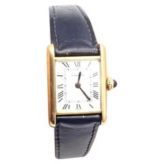 Montre-bracelet Mini Tank en or jaune pour femmes Cartier