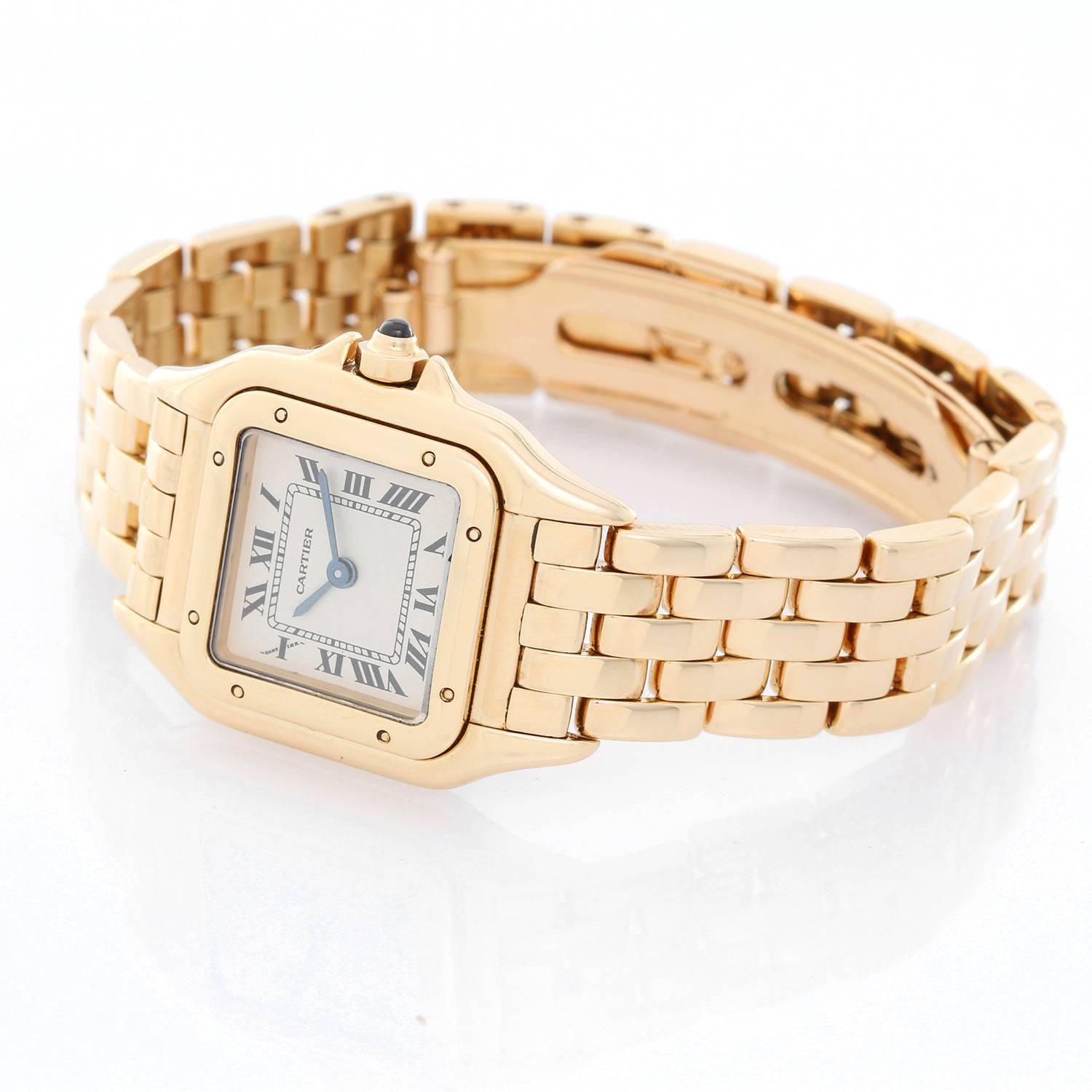 Cartier Panther Ladies 18k Yellow Gold Panthere Watch W25022B9 - Quartz. 18k yellow gold case (21mm x 30mm).  Ivory colored dial with black Roman numerals. 18k yellow gold Panther bracelet. Pre-owned with box and book.