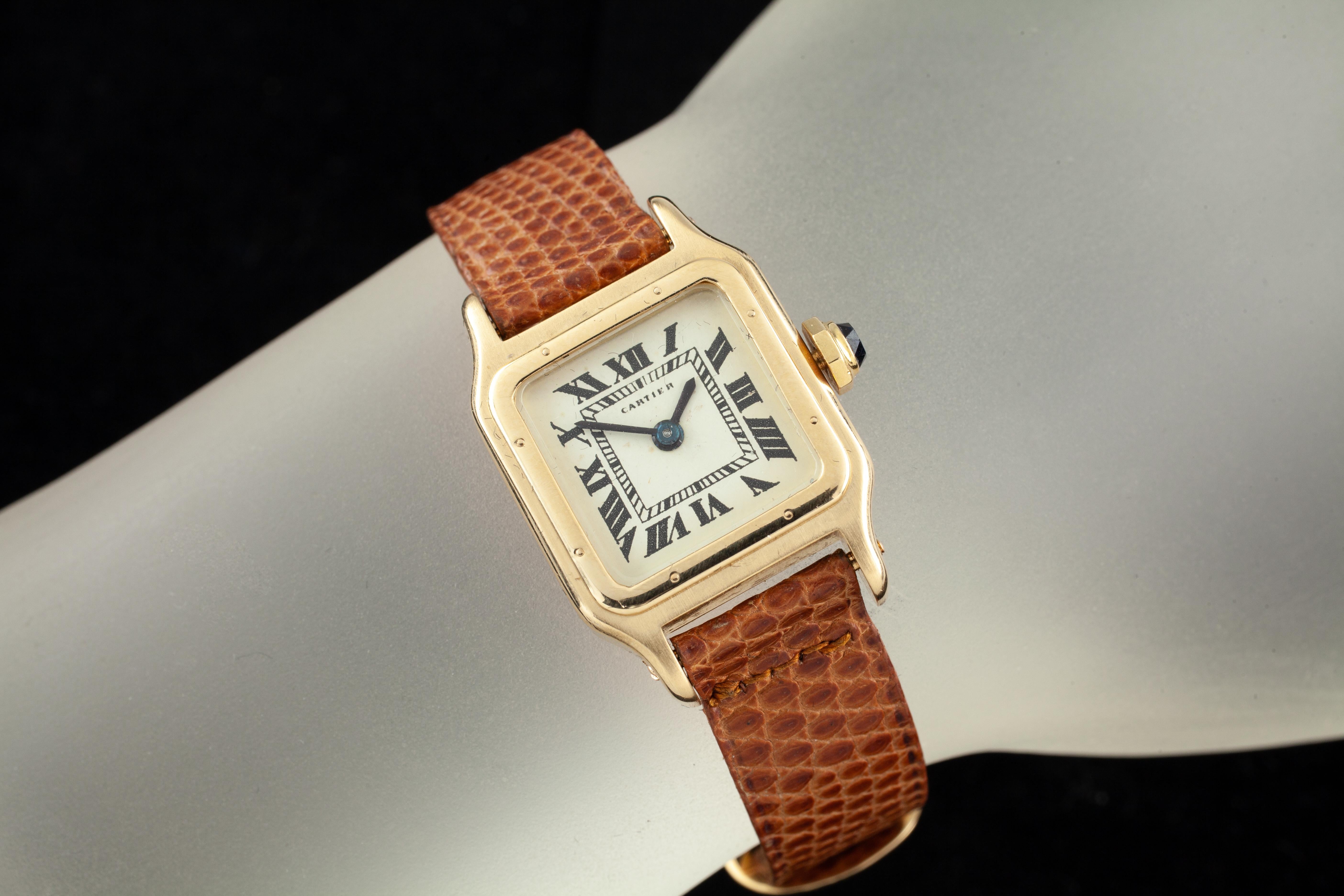 Movement #168 (17 jewels)
Case #46231
18k Yellow Gold Case w/ Faceted Sapphire Crown
20 mm Wide (23 mm w/ Crown)
20 mm Long
Lug-to-Lug Distance = 29 mm
Lug-to-Lug Width = 12 mm
Thickness = 5 mm
Beige Dial w/ Black Roman Numerals
15 mm Wide
14 mm