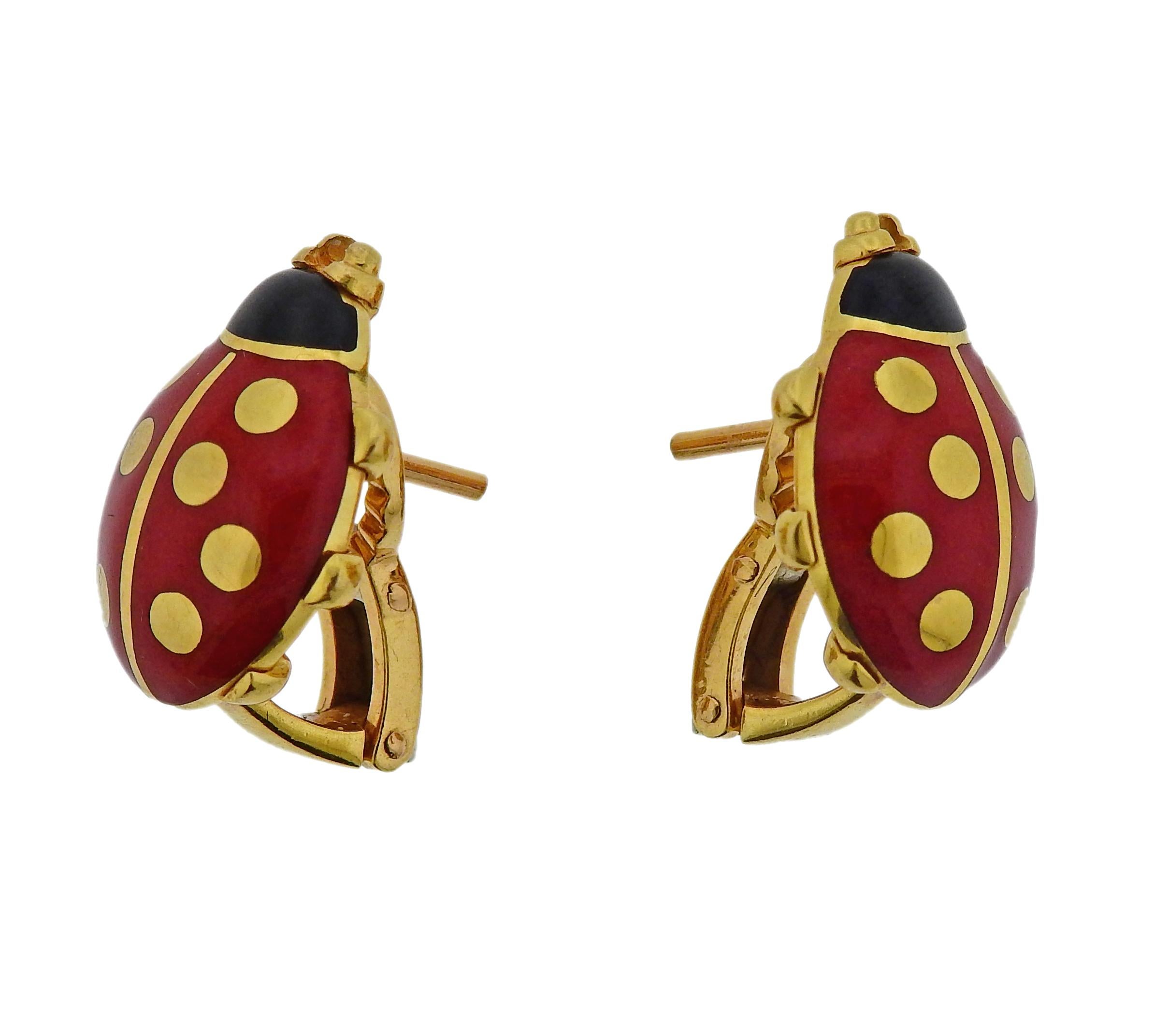 Adorable ladybug earrings by Cartier, set in 18k yellow gold with enamel. Earrings are 17mm x 13mm. Weigh 10.3 grams. Marked: Cartier, B45606, 1990, 750.