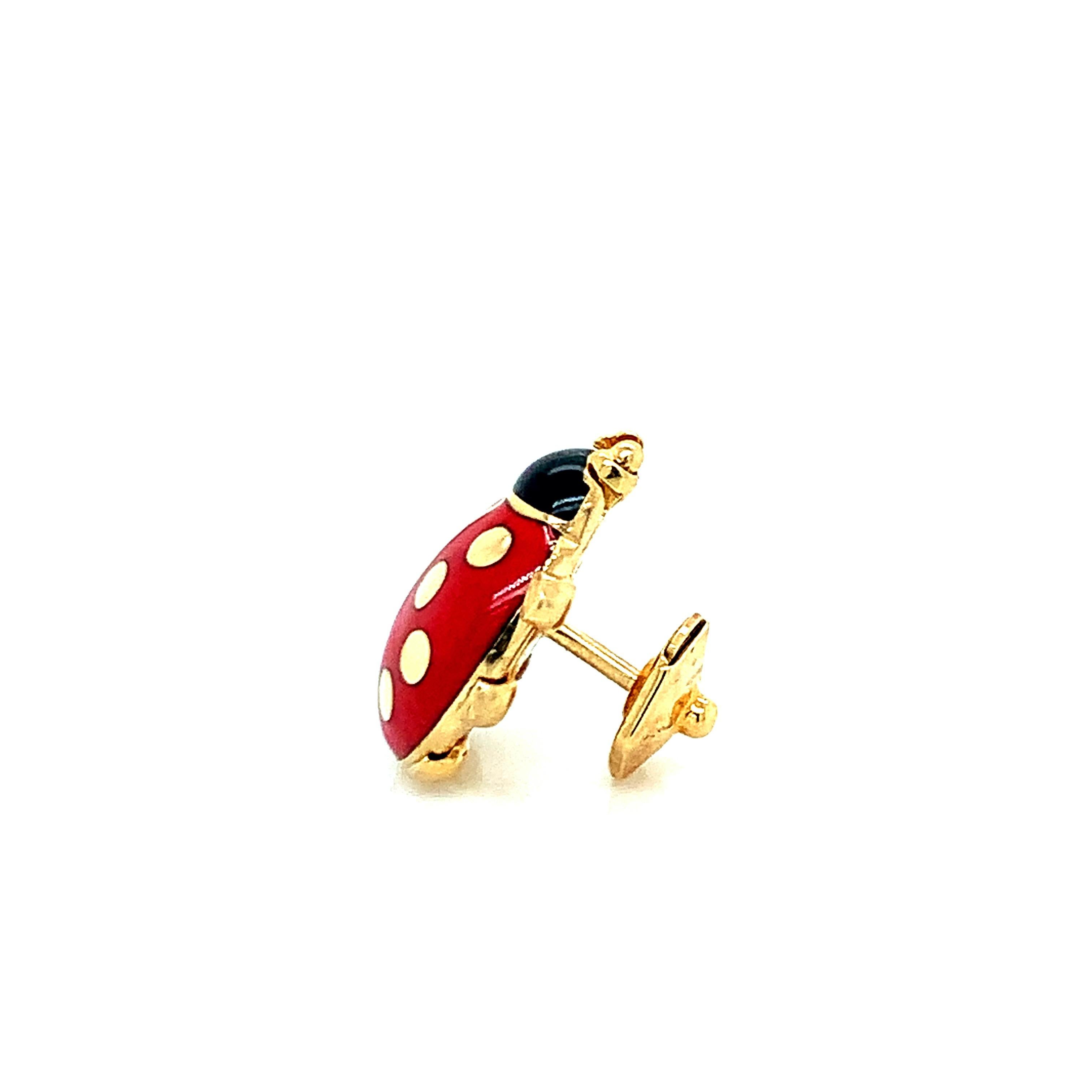 A Cartier creation, this enameled ladybug pin is made out of 18 karat rose gold. Marked Cartier 1990. Total weight: 4.3 grams. Length: 1.7 cm. Width: 1.2 cm. 

Serial No. 997639