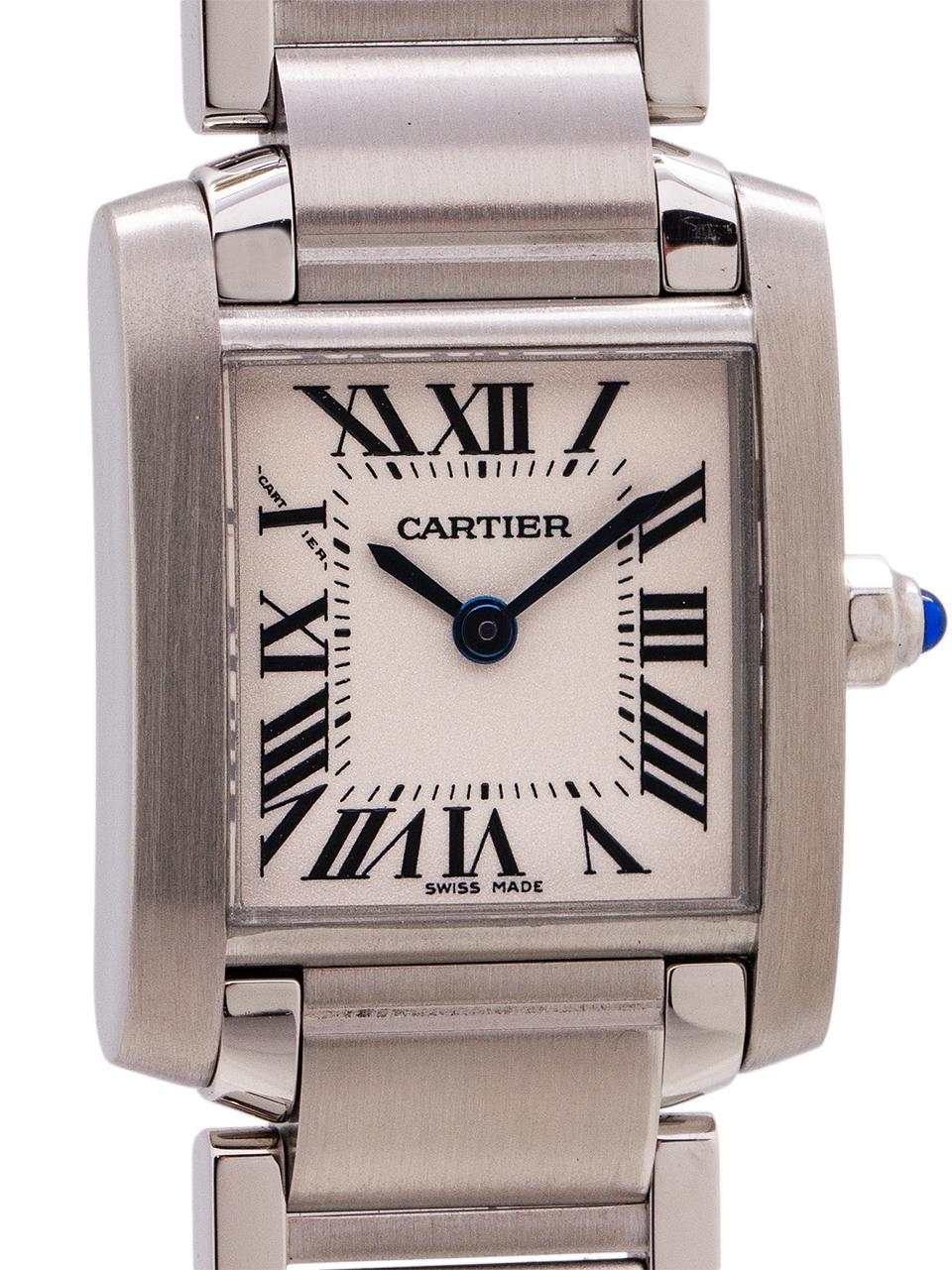   
Cartier Stainless Steel Lady Tank Francaise ref 3217 circa 2018. This virtually brand new Tank features a 20 X 25mm stainless steel case with sapphire crystal and blue sapphire cabochon crown. Classic antique white dial with black Roman numerals