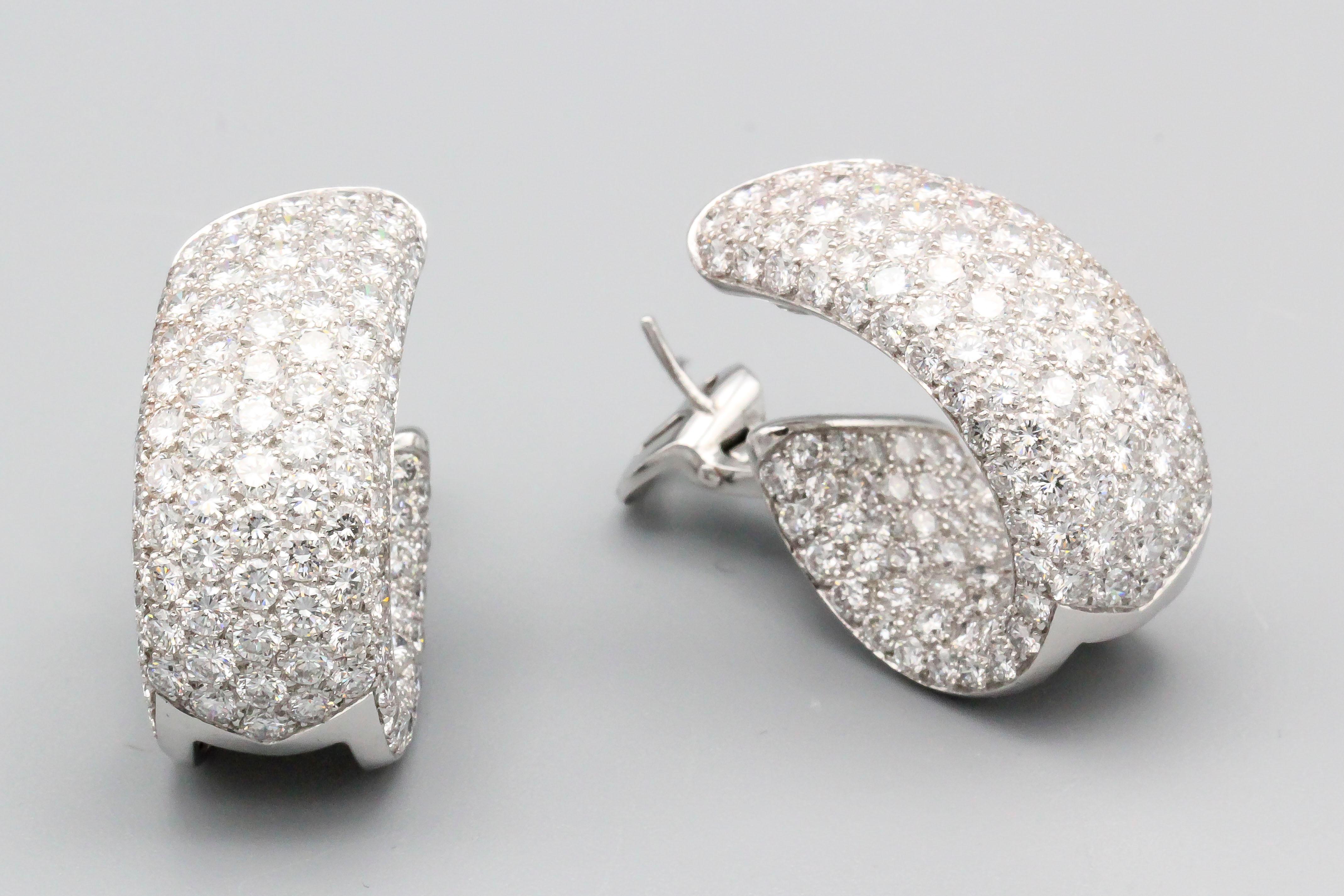 Very fine pair of 18K white gold and pave diamond 
