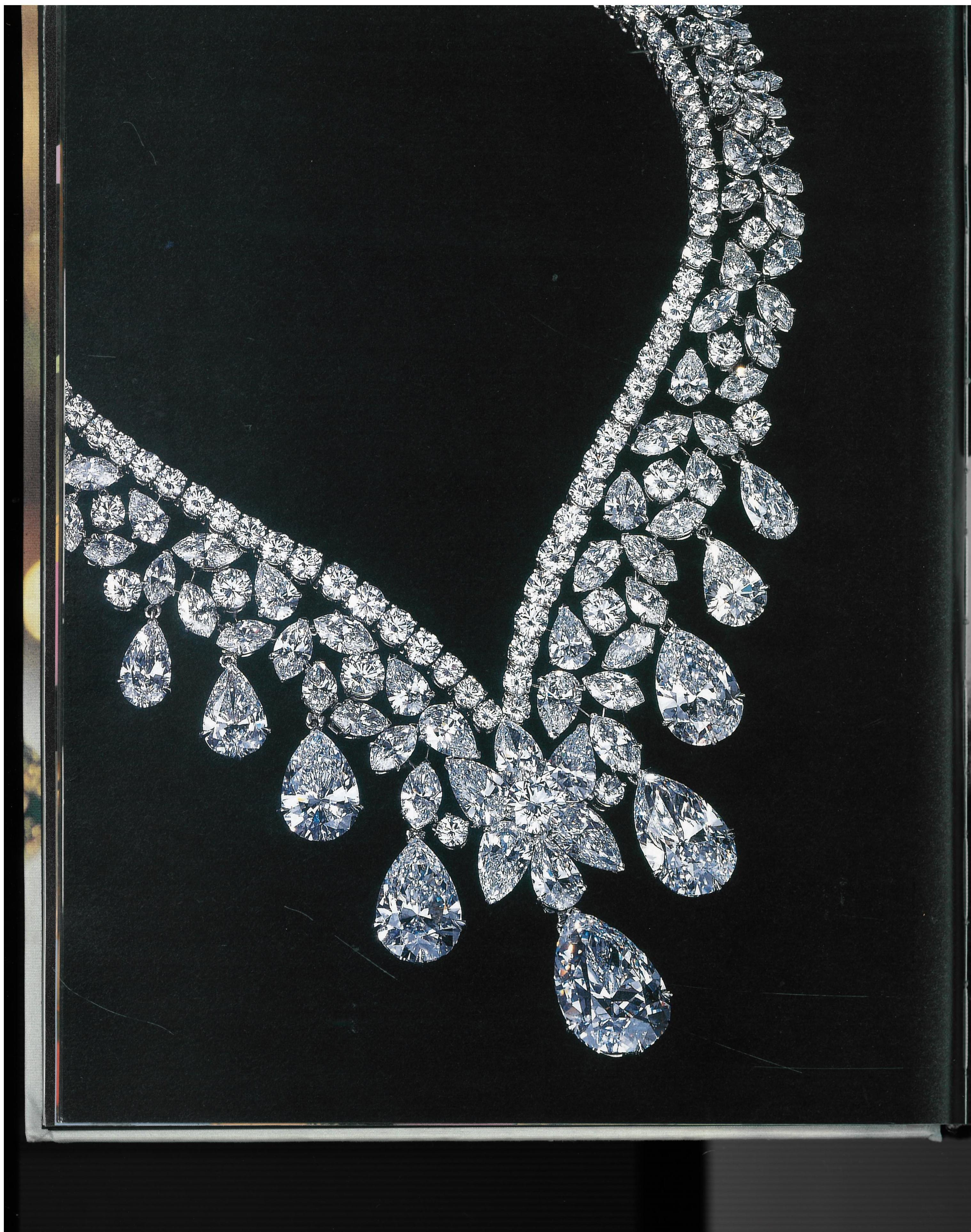 A large beautiful photographic book on the work of the renowned house of Cartier. There is an illustrated index with text in French and English to the rear of the book with descriptions of the pieces that feature in each of the full page