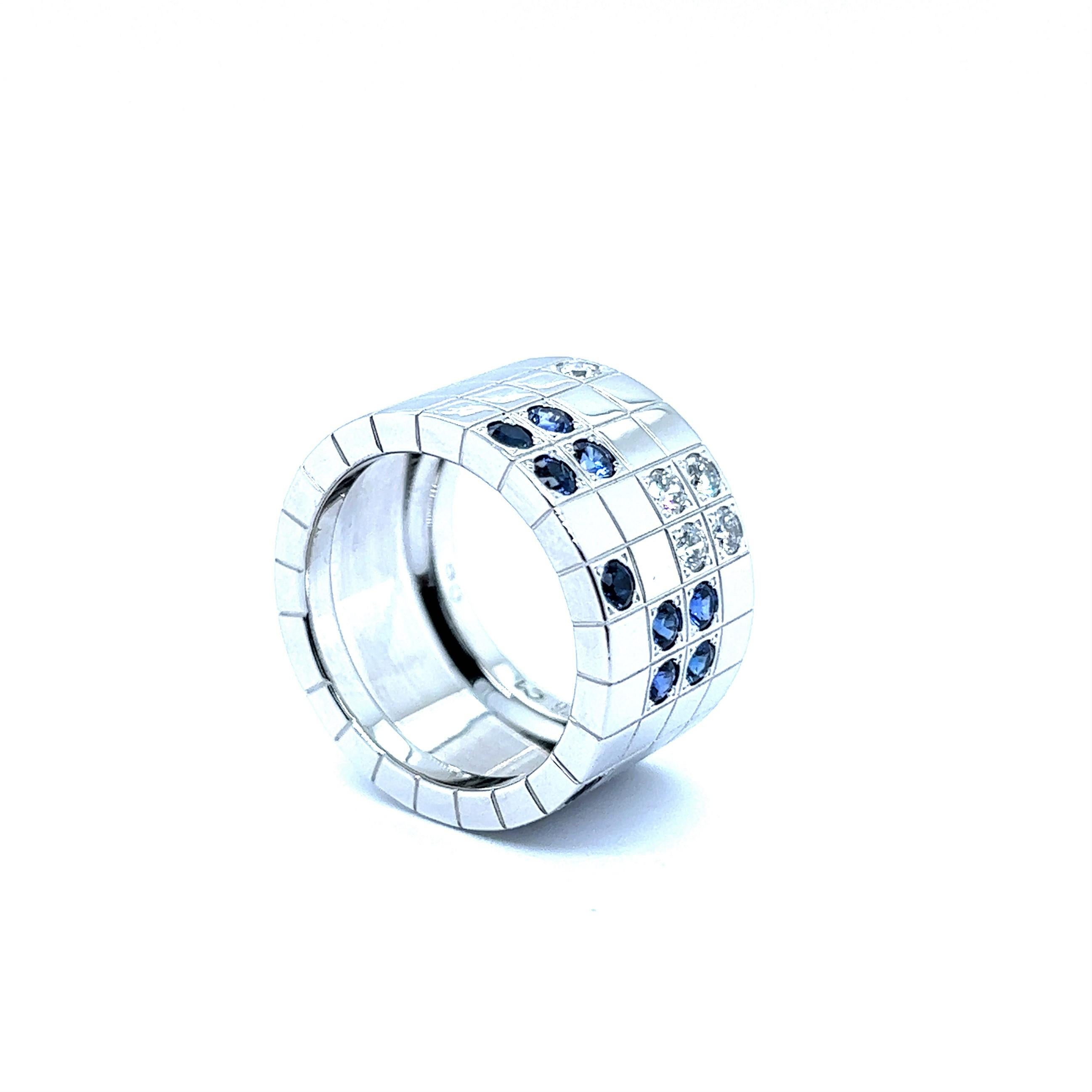 Ein außergewöhnlicher Ring mit Saphiren und Diamanten aus der Kollektion Lanières des berühmten Juwelierhauses Cartier. 

Dieses exquisite Stück ist mit einem stilvollen geometrischen Muster aus massivem 18-karätigem Weißgold versehen, das für einen